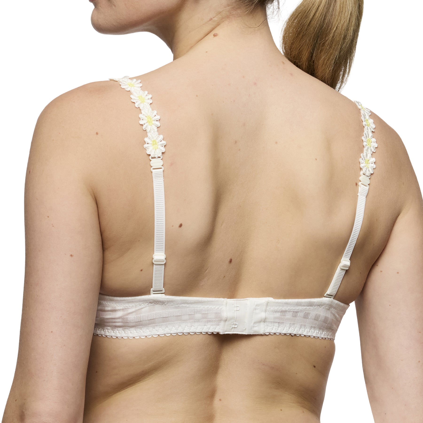 Back view of the ivory padded balcony bra showing adjustable straps, hook-and-eye closure, and smooth supportive band.