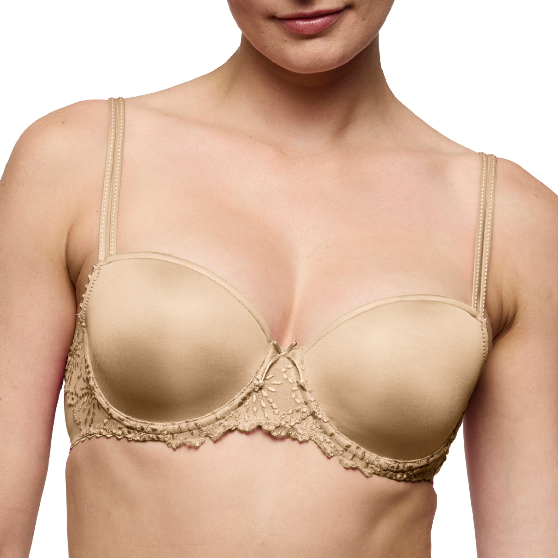 Close-up of the Marie Jo Jane padded balcony bra in Sand showcasing seamless moulded cups, refined floral embroidery, and supportive underwire construction.