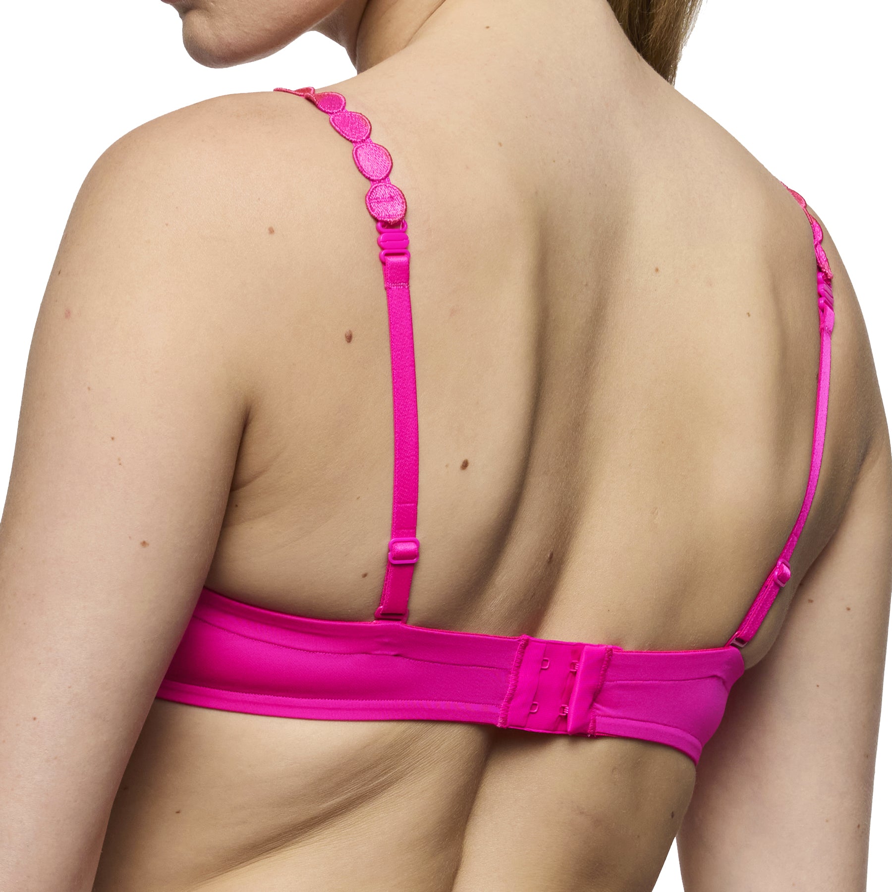 Back view of influencer pink padded balcony bra showing adjustable straps and hook-and-eye closure