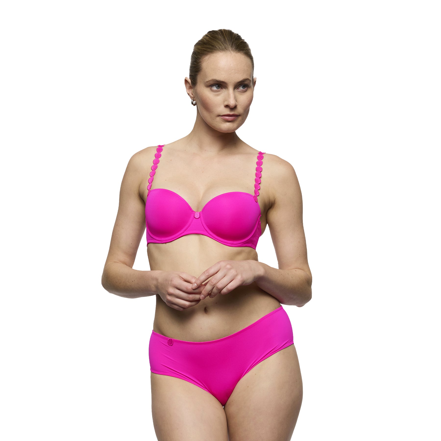 Model wearing influencer pink padded balcony bra and matching brief, showcasing a smooth fit and vibrant colour