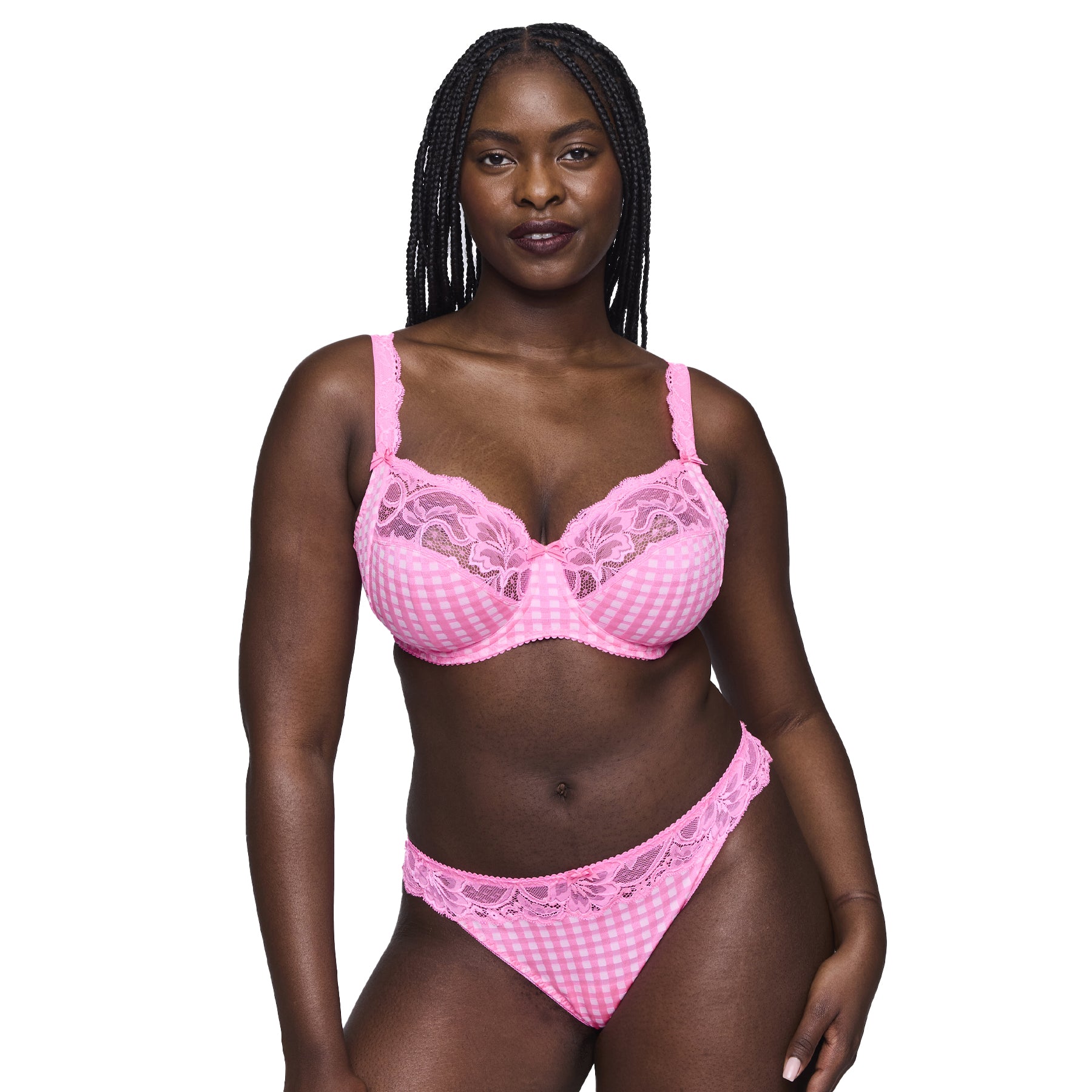 Woman modeling a pink gingham bra with floral lace and a coordinating lace-trimmed thong.