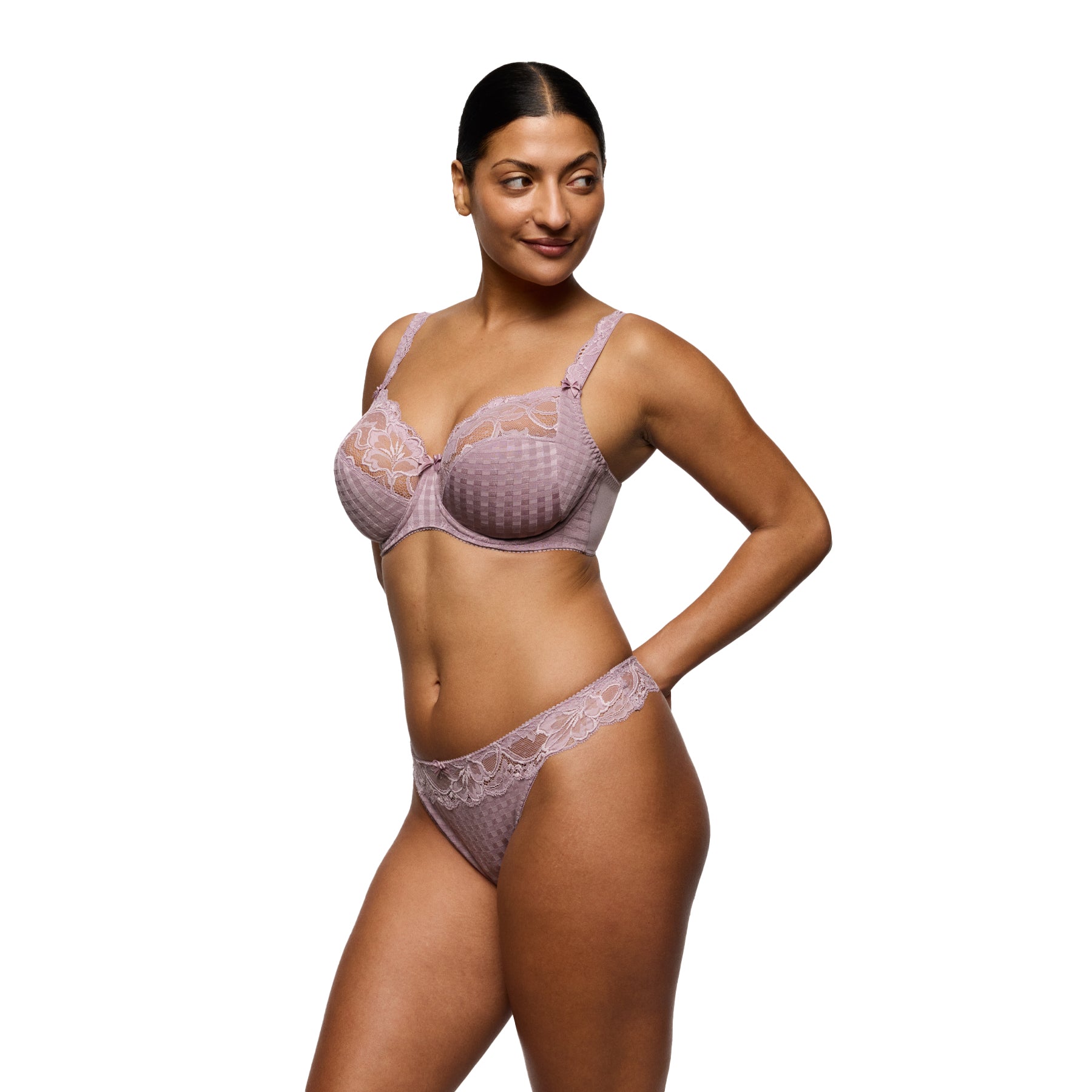 Three-quarter view of a mauve lace underwire bra and matching thong worn by a model, highlighting the elegant fit and coordinated set.
