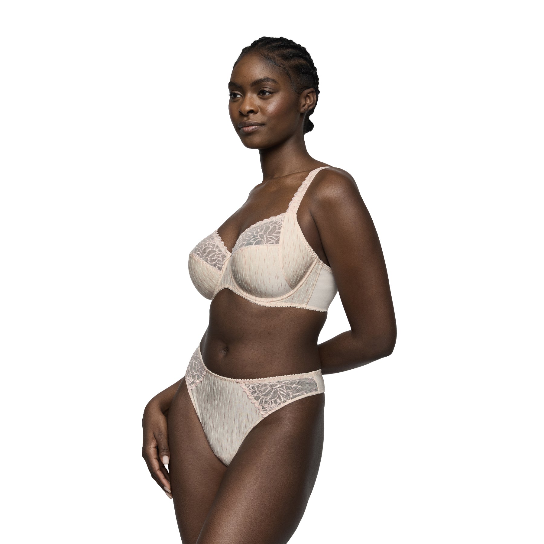 Side profile of a model wearing the PrimaDonna Monterrey full cup bra and matching briefs in Venus, highlighting forward shaping, supportive fit, and feminine lace details.