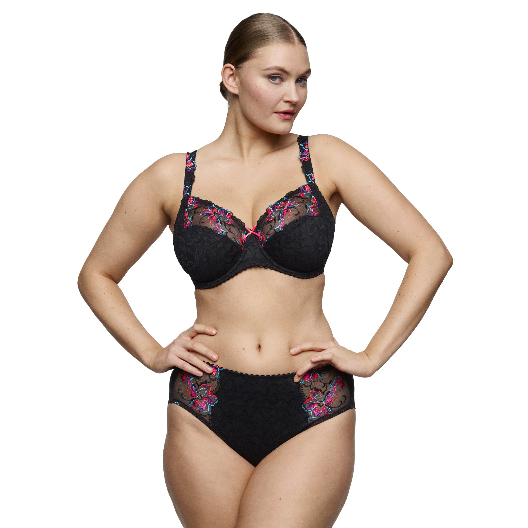 PrimaDonna Miyara bra in black with colourful floral embroidery, styled with matching high-waist briefs.
