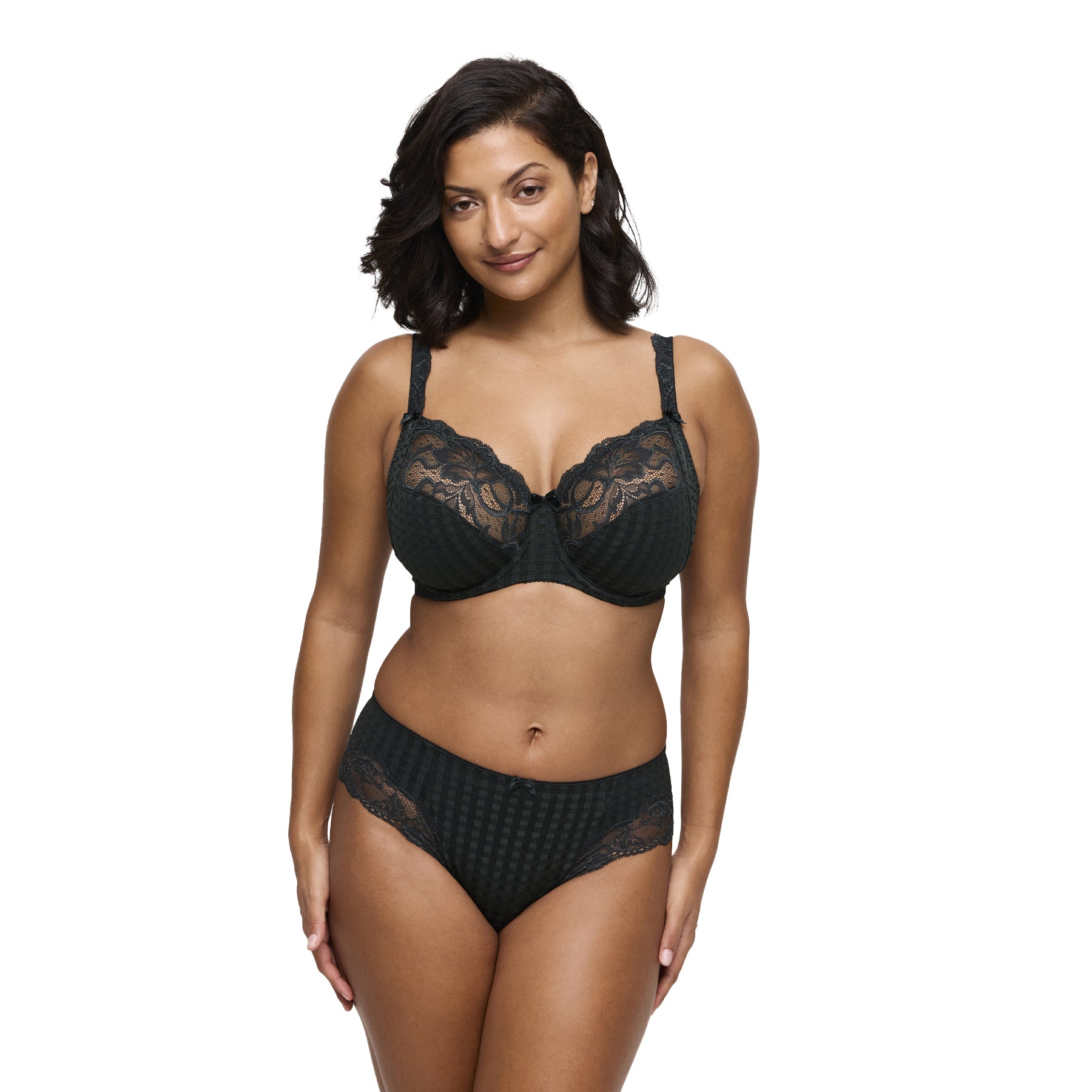 Woman wearing deep green full-cup lace bra and matching briefs, PrimaDonna Madison collection, front view.