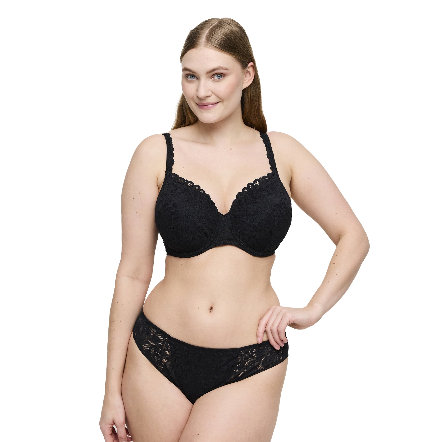 Model wearing black lace bra with matching lace panty set