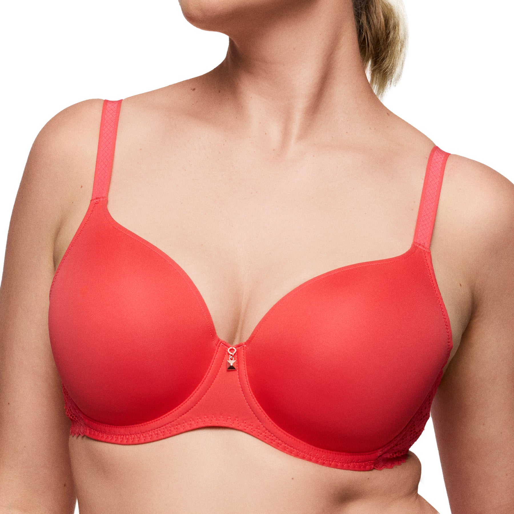 Close-up front view of a coral smooth underwire bra on model, highlighting clean cup shape and adjustable straps.