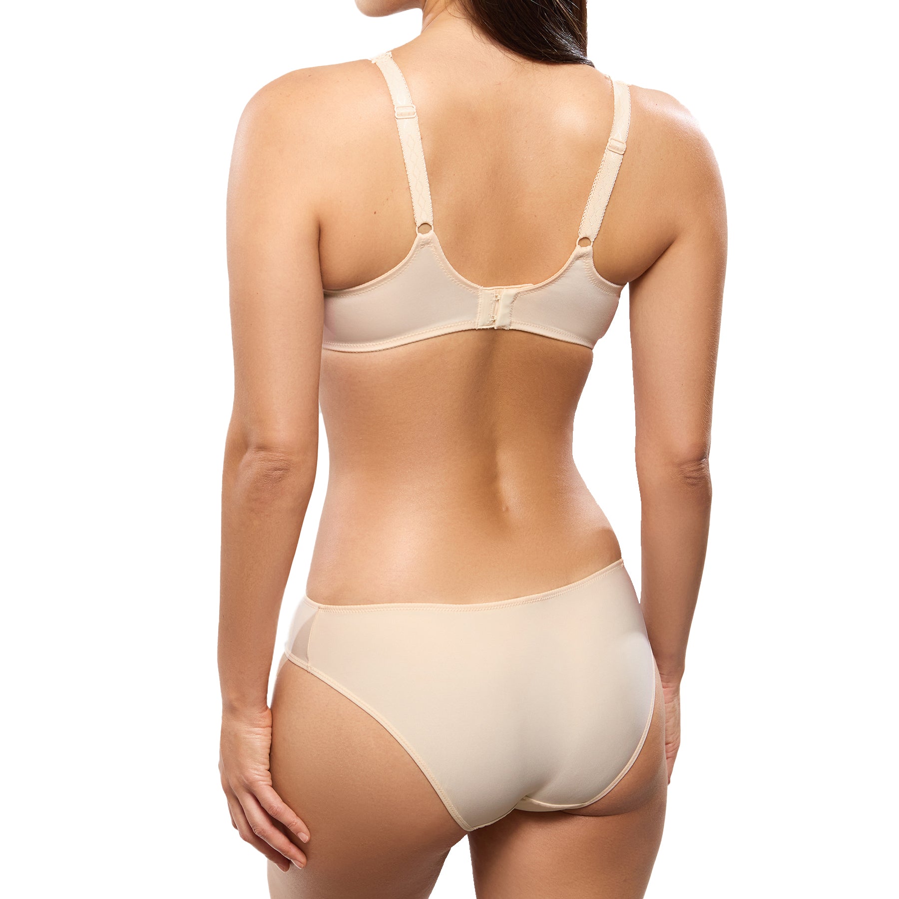 A model showing the back view of the matching nude-colored lingerie set, highlighting the comfortable full-coverage brief and the supportive bra with adjustable straps.