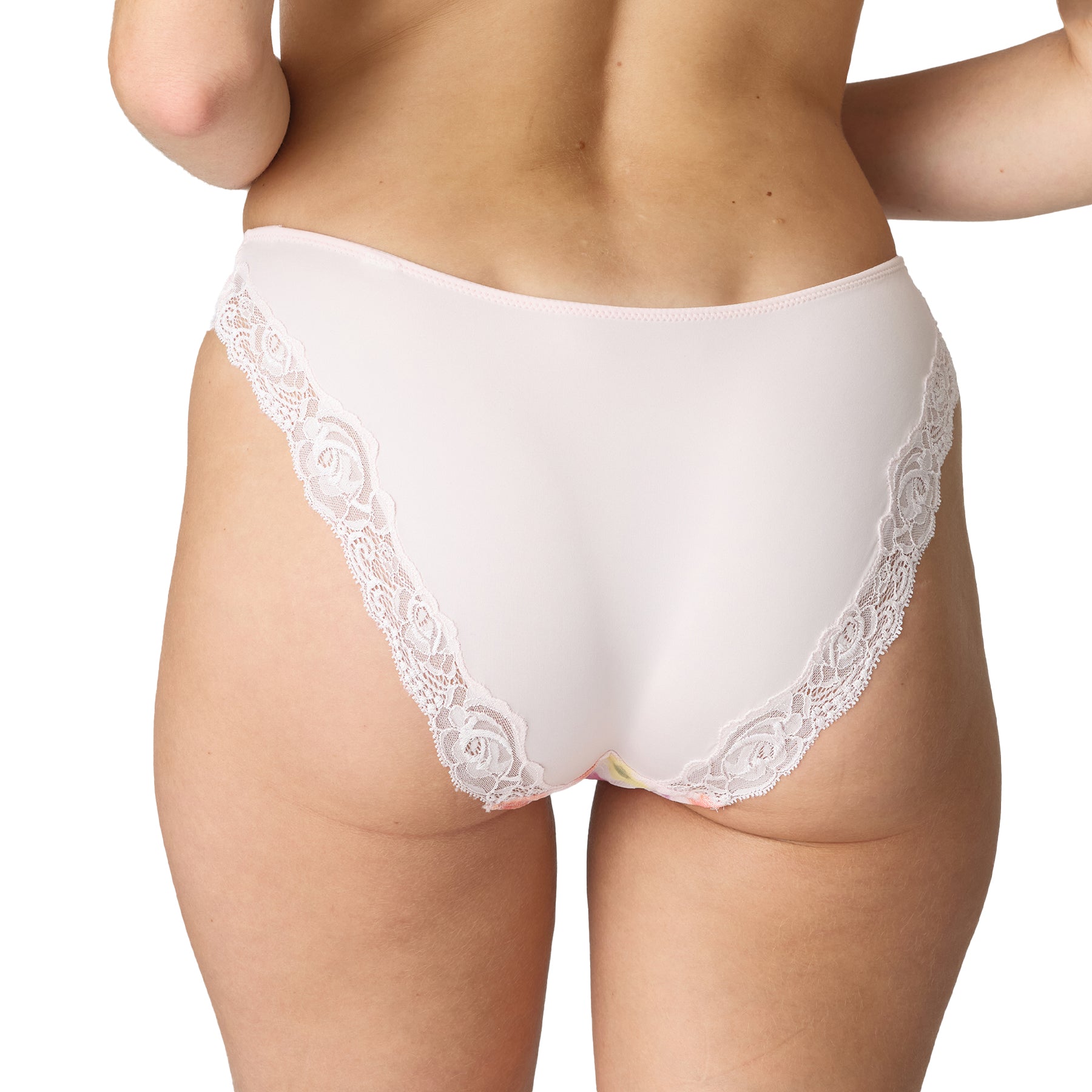 Back view of a woman wearing a pale pink panty with smooth fabric and lace trim along the leg openings.