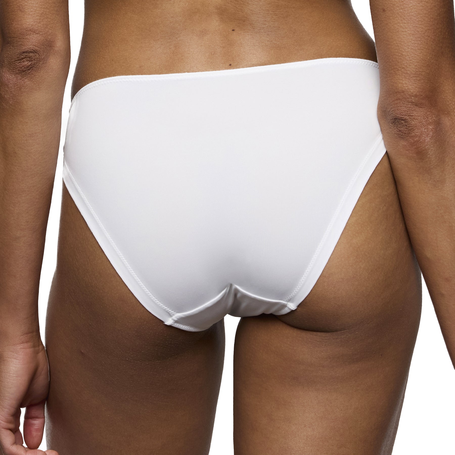 Back view of white bikini brief with smooth finish and seamless edges on model.