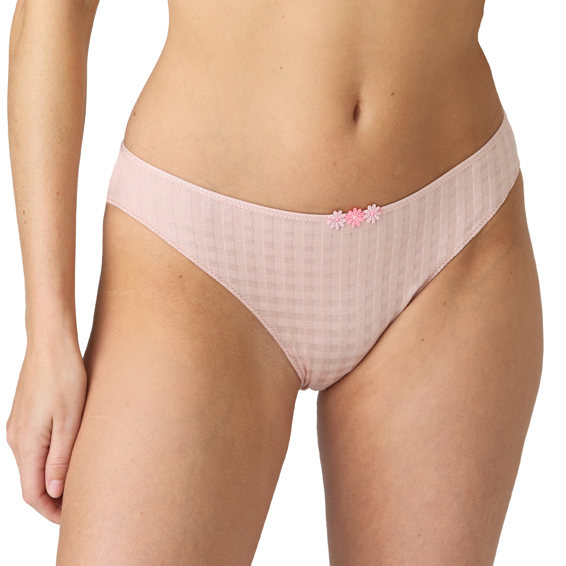Close-up of pastel pink gingham bikini panties with floral embroidery, worn by a model.