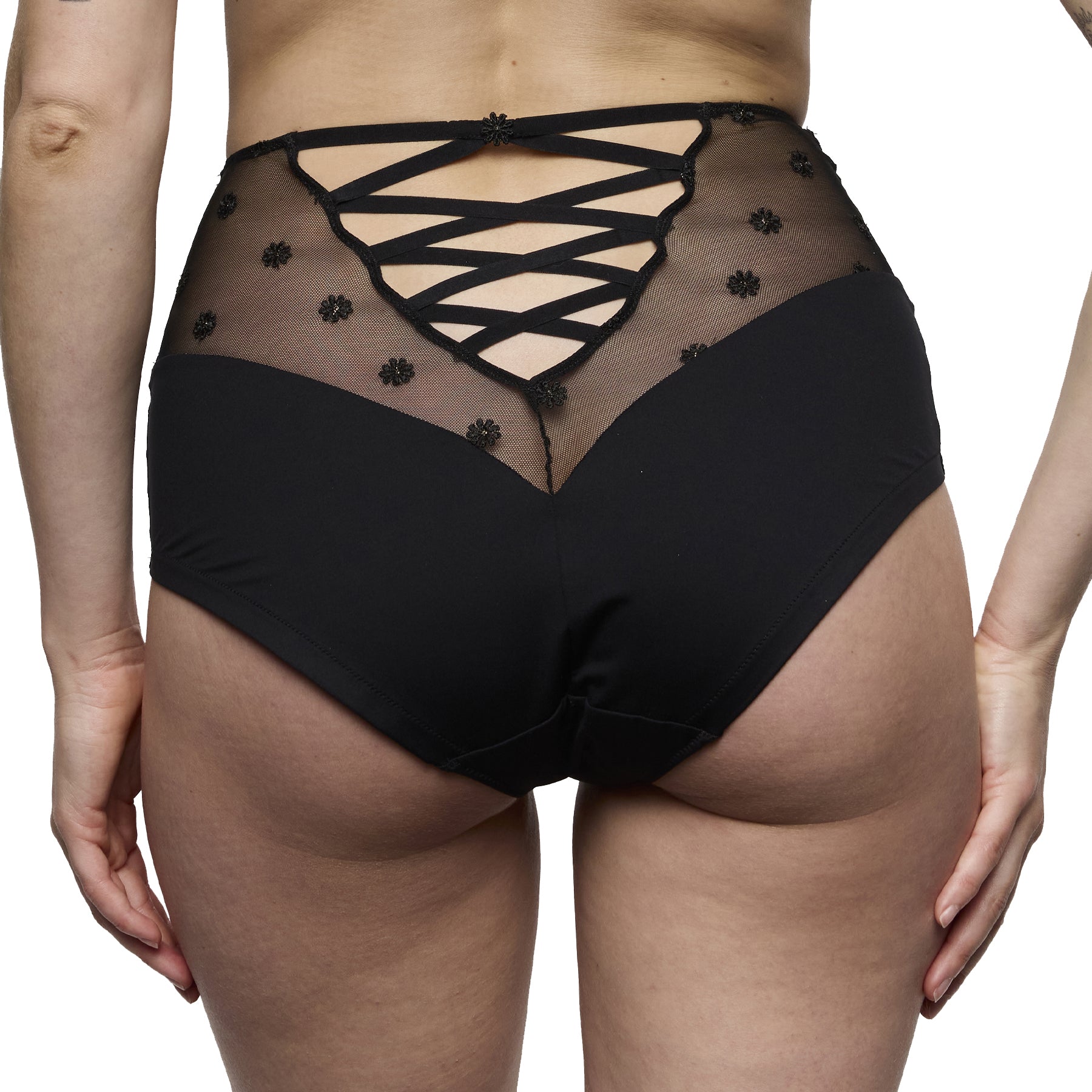 Back view of a black high-waisted brief featuring sheer embroidered mesh and a lace-up strap detail.