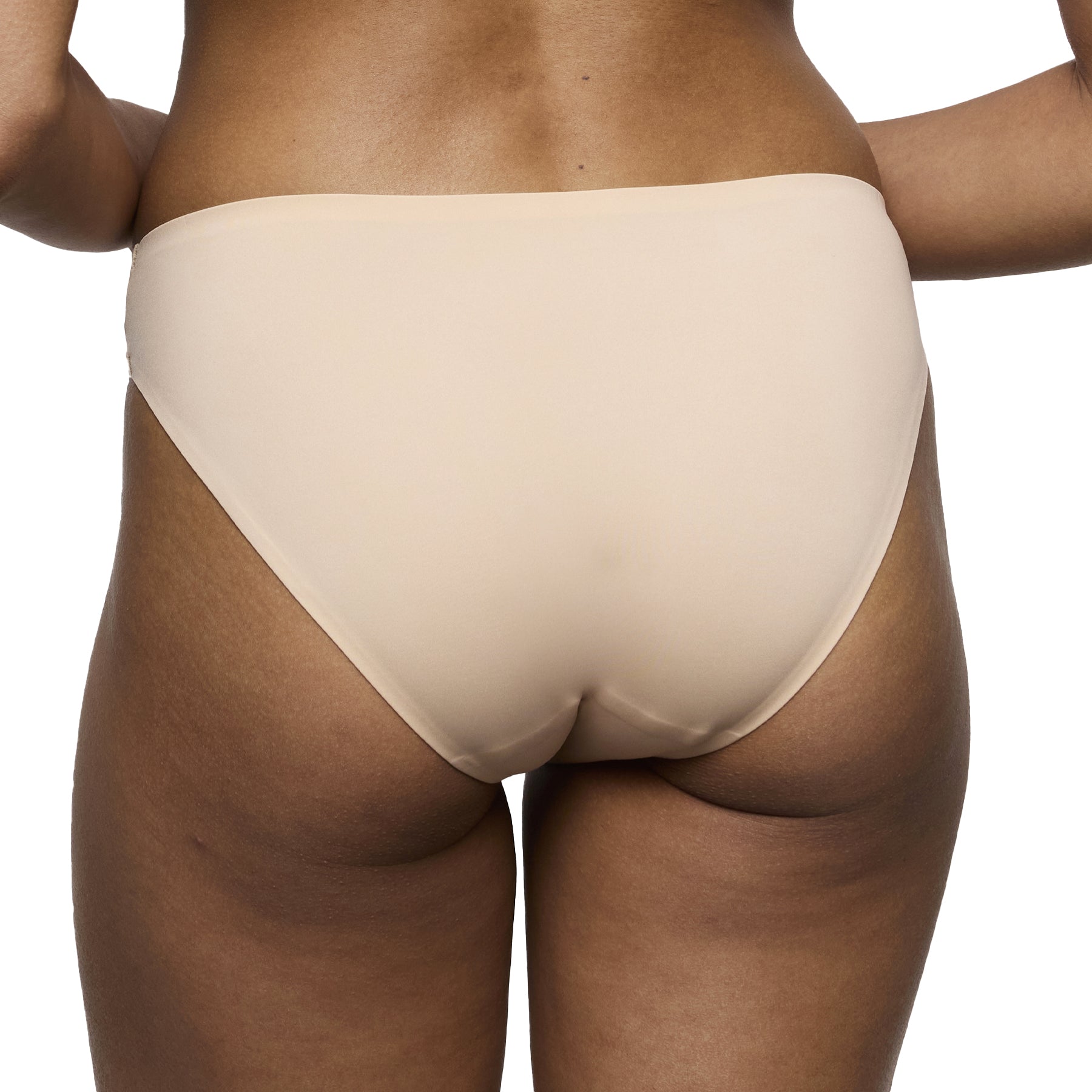 Back view of nude seamless bikini brief with smooth fabric and invisible finish under clothing