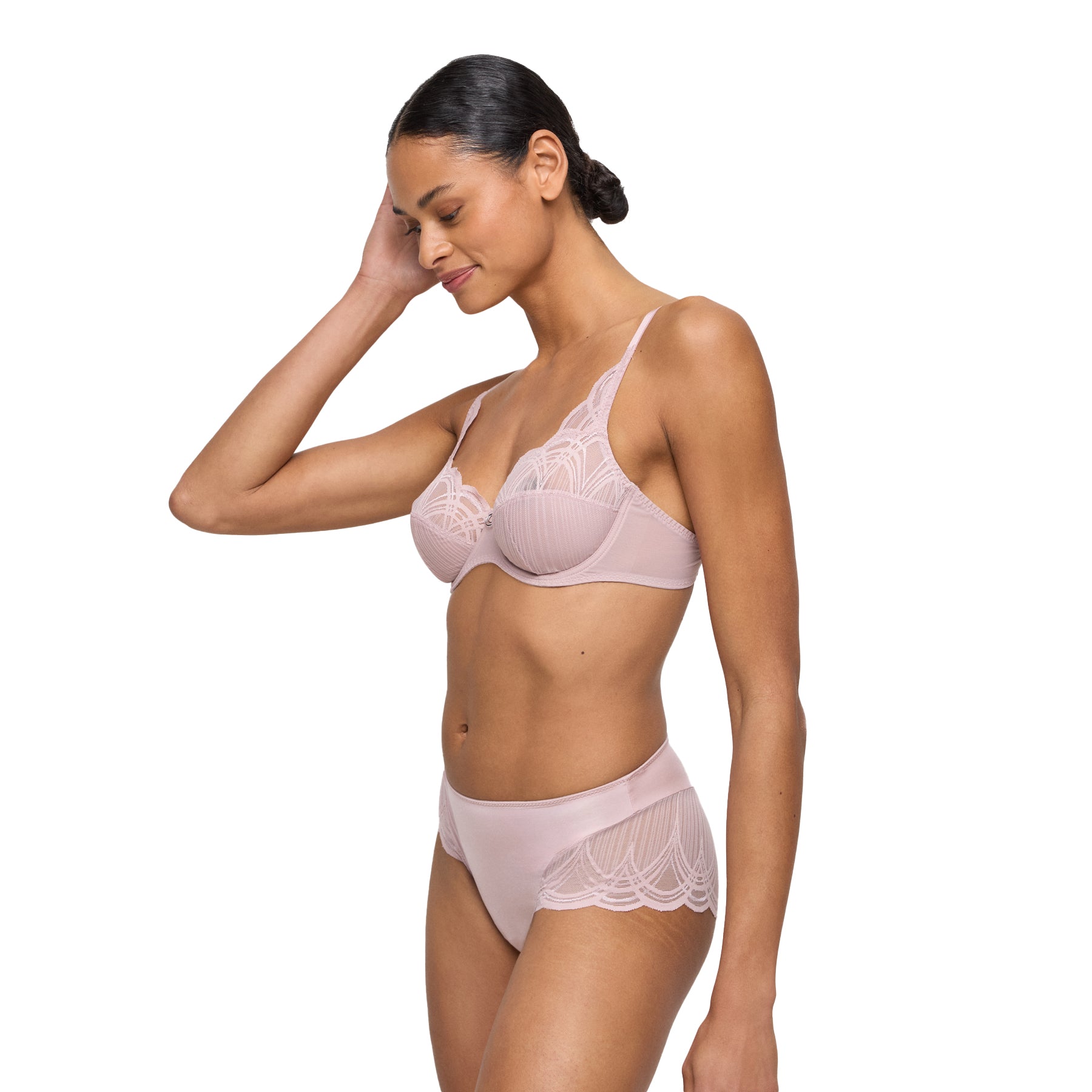 Side view of woman wearing mauve lace bra and matching full brief with sheer embroidered sides.