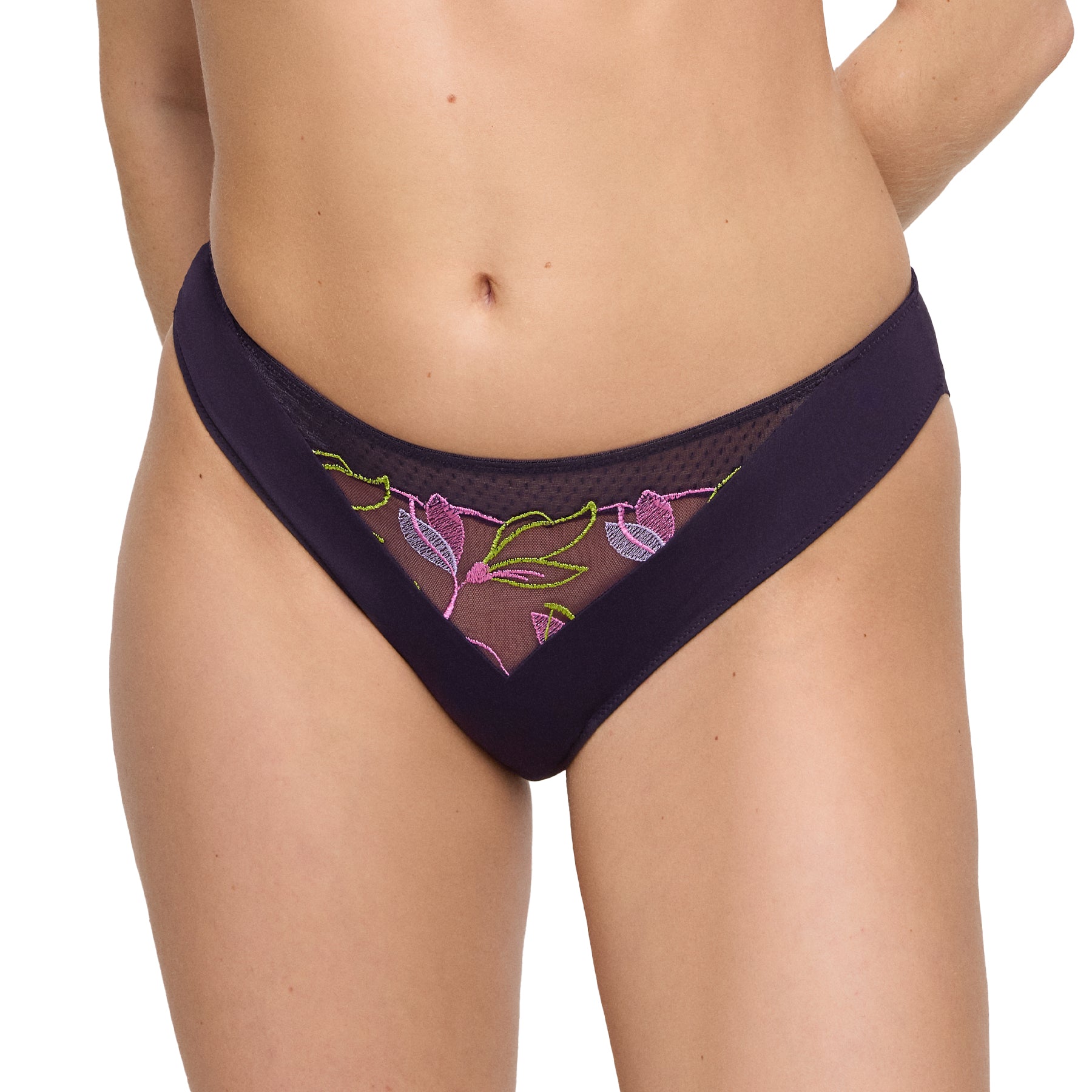 Front view of model wearing plum thong featuring mesh insert with bright floral embroidery