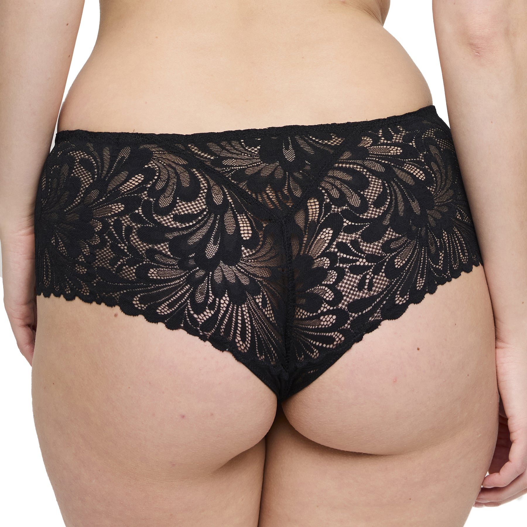 Back view of black floral lace panties with scalloped edges on model