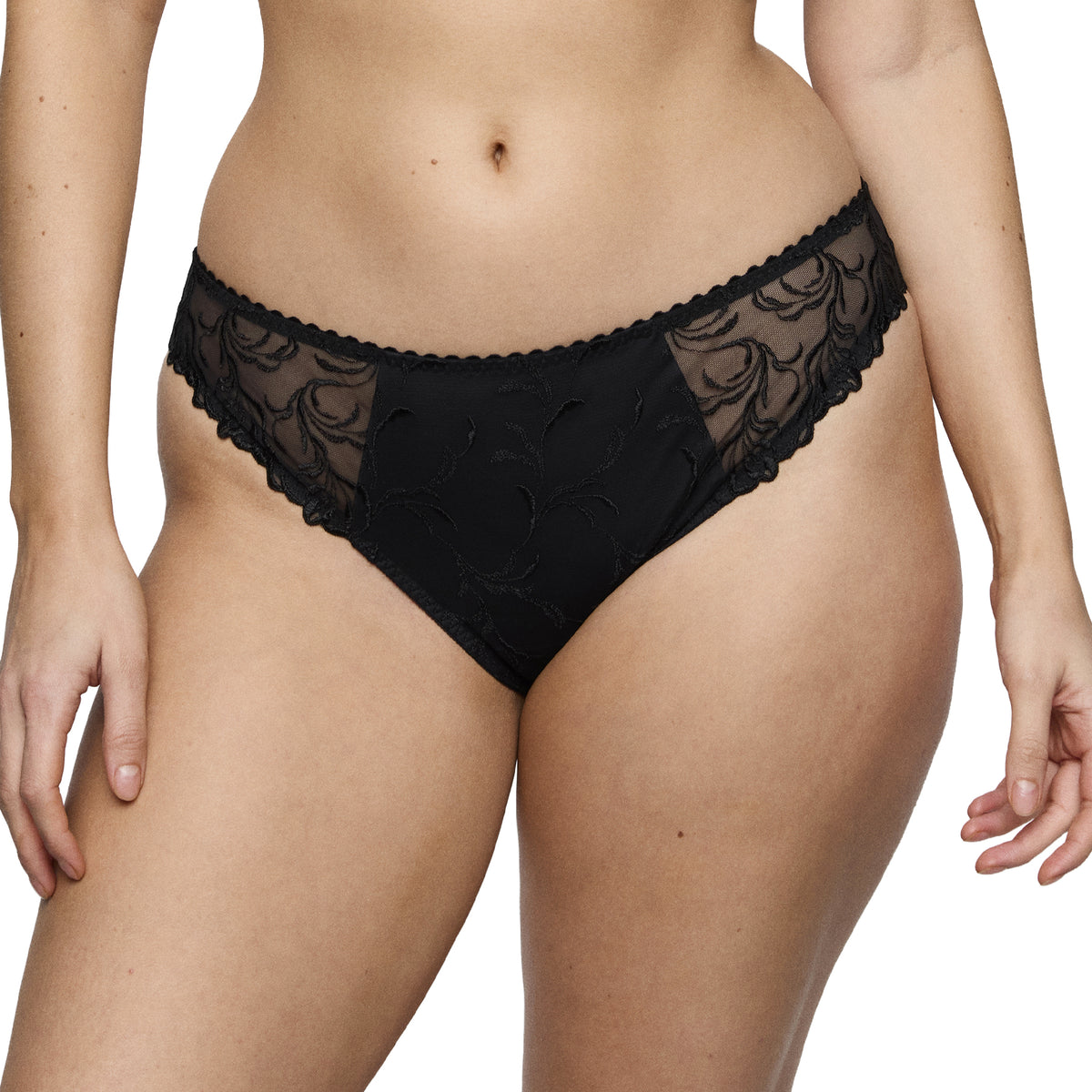 PrimaDonna Solisse Rio Brief in black with sheer floral embroidery and smooth front panel.