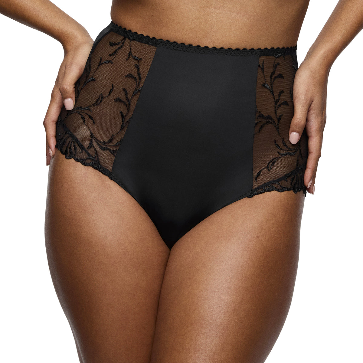 PrimaDonna Solisse High Waist Brief in black with a smooth opaque front panel and sheer floral embroidered sides.