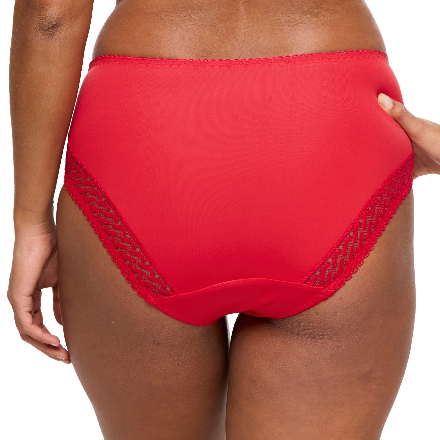 Back view of red high-waisted brief on model, showing full coverage and lace detail.