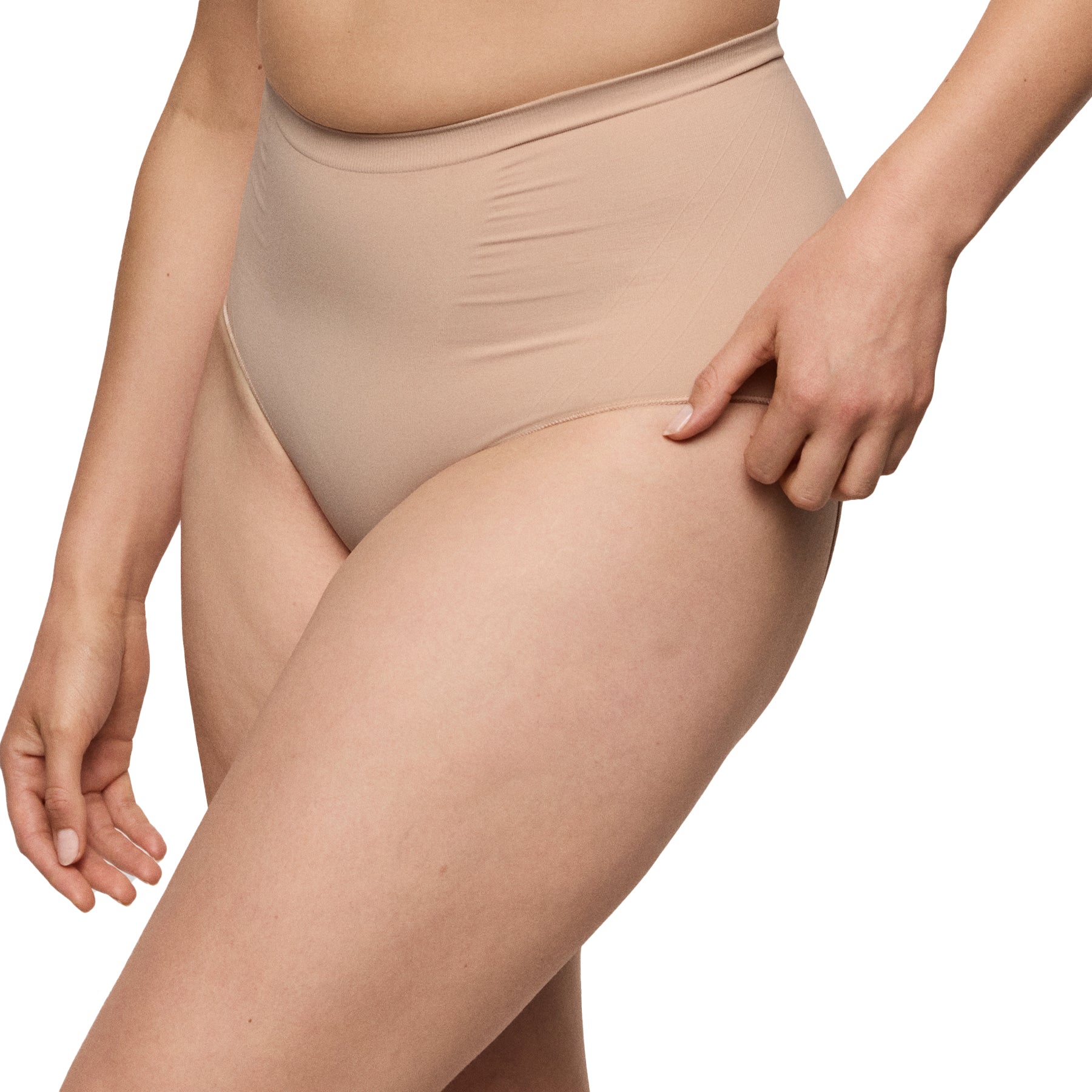 Side angle of beige seamless shaping panties showing smoothing compression fabric