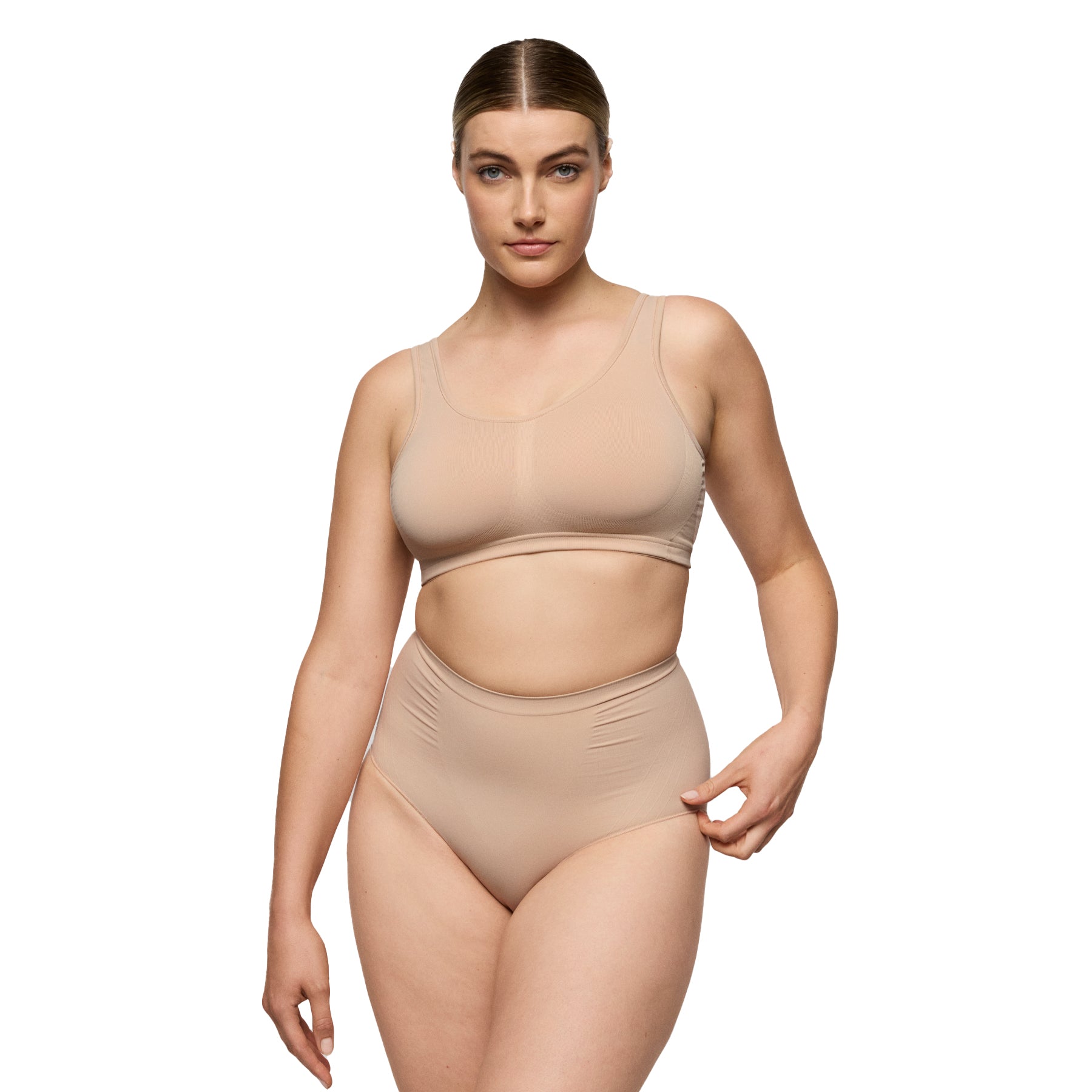 Model wearing nude seamless bralette and high-waisted shaping brief - full body view