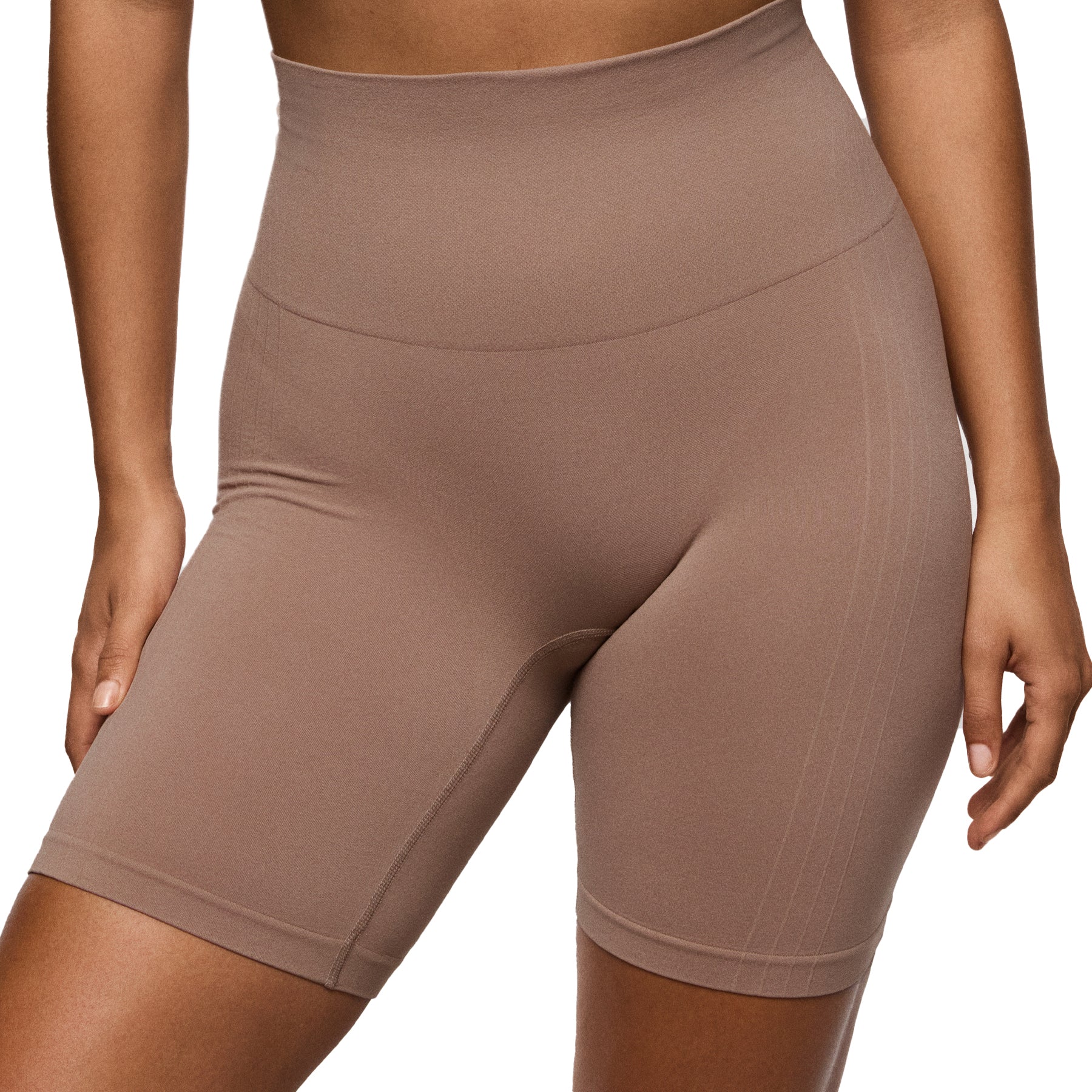 Model wearing high-rise anti-chafing shorts with smooth tummy control panel