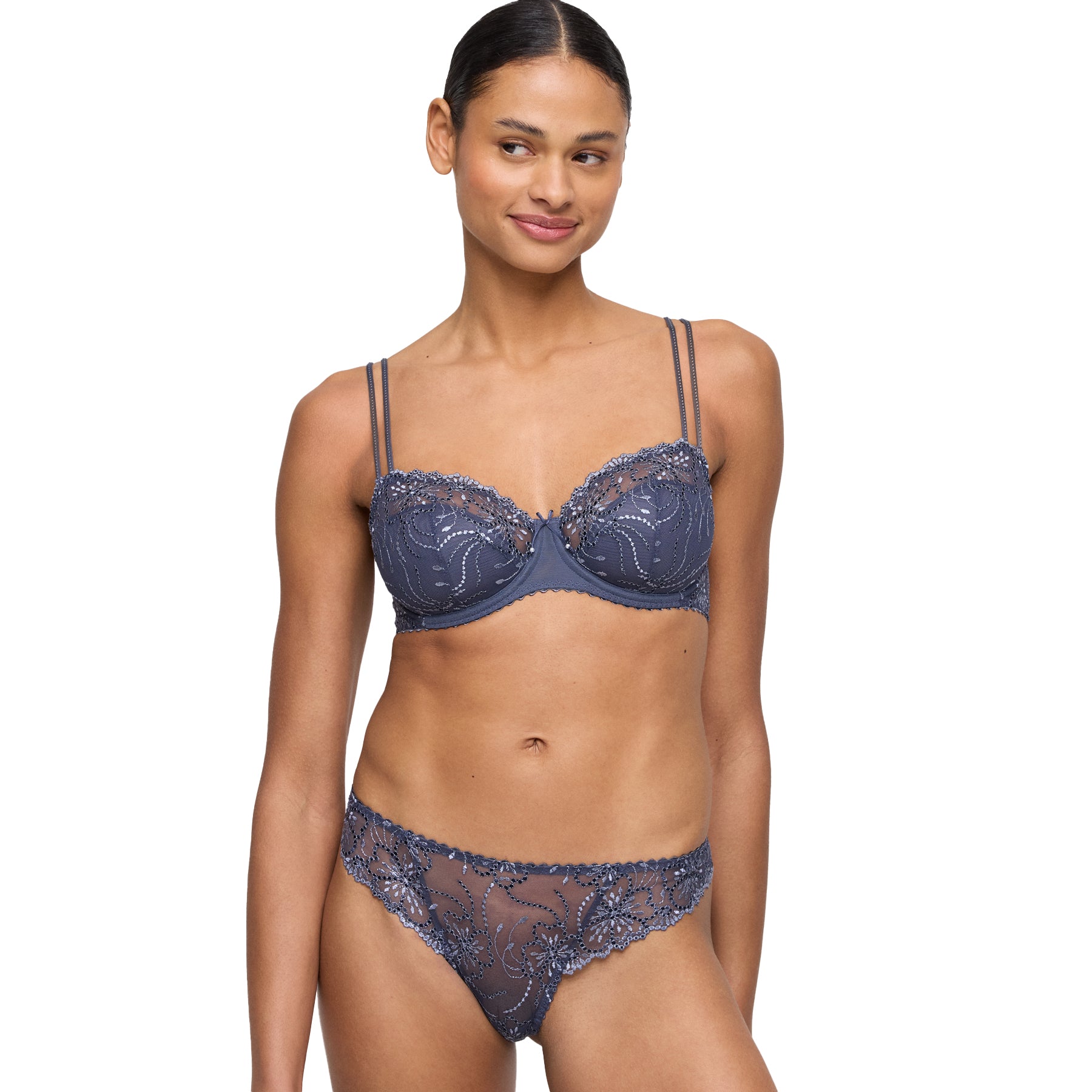 Model wearing Blue Shadow lingerie set with balconette bra and matching lace thong.