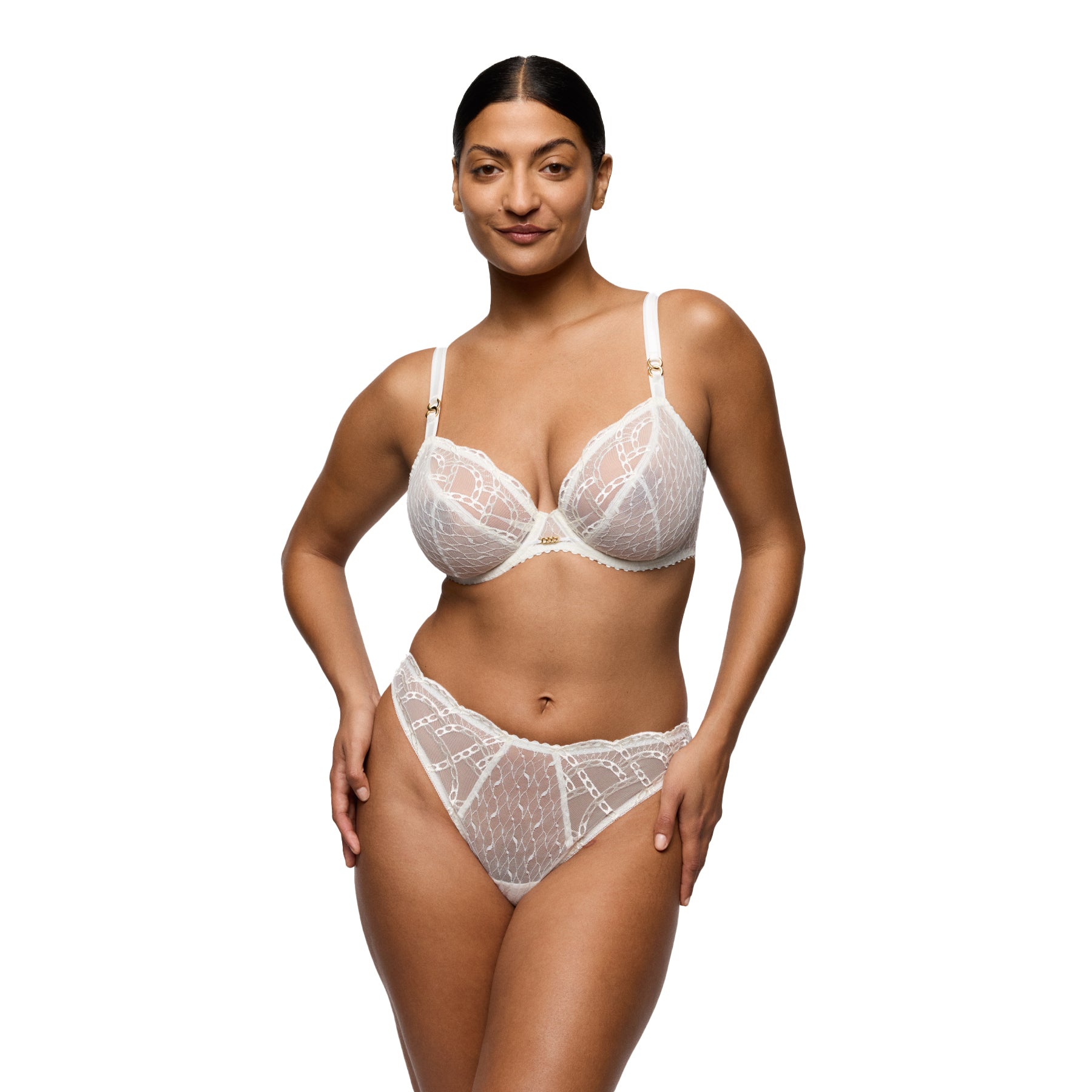 Woman wearing an ivory lace underwire bra with matching sheer lace briefs, shown on a model against a white background.