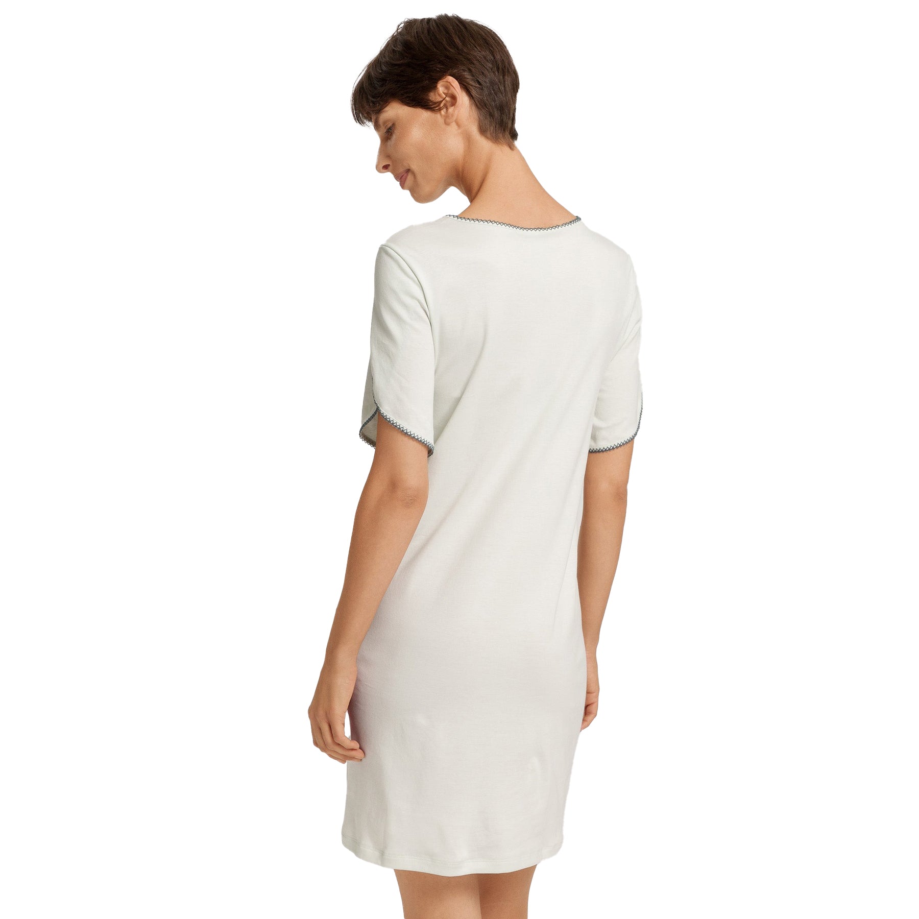 Back view of light mint nightdress on model, highlighting relaxed fit and smooth drape.