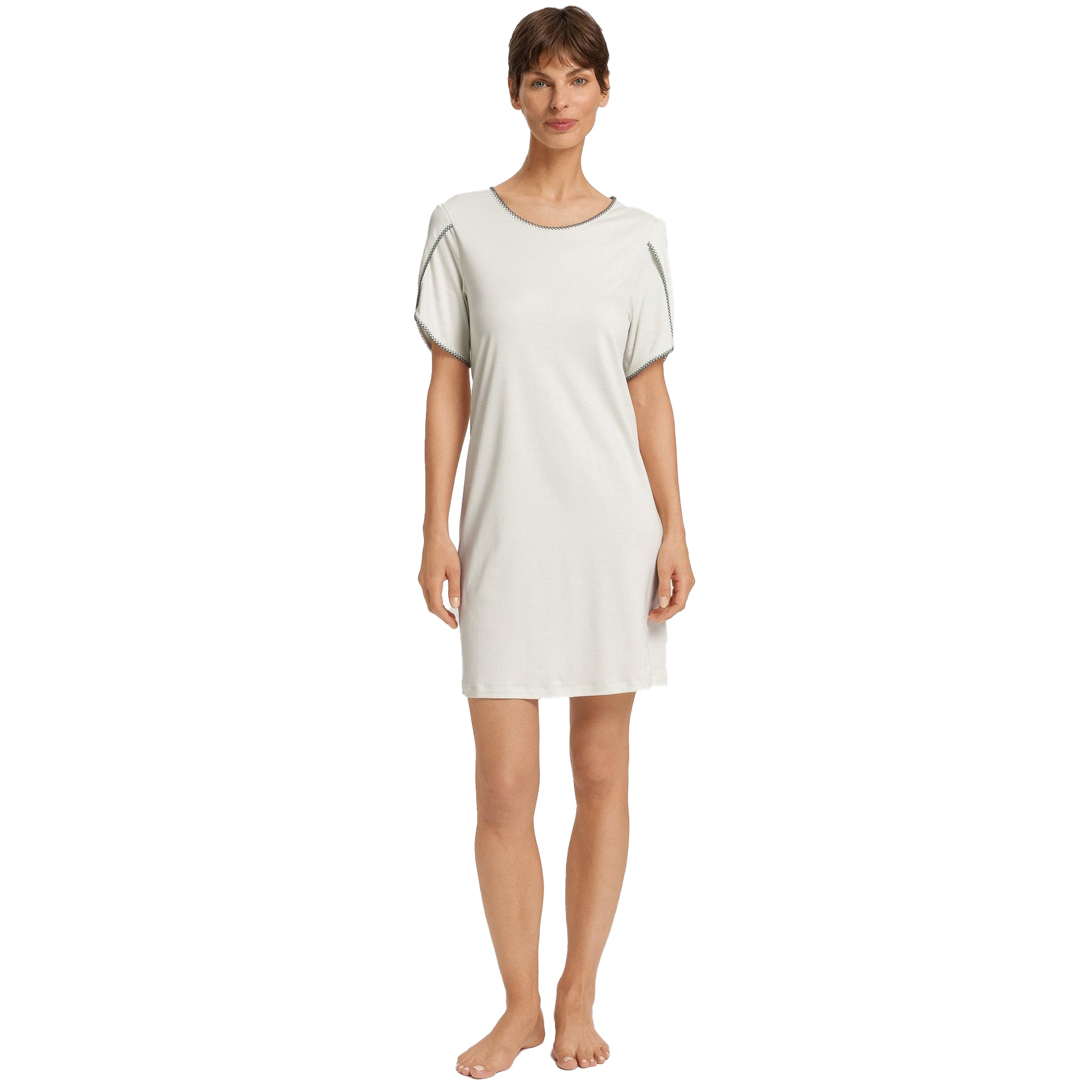 Model wearing light mint nightdress with scalloped trim, front view showing comfortable knee-length cut.