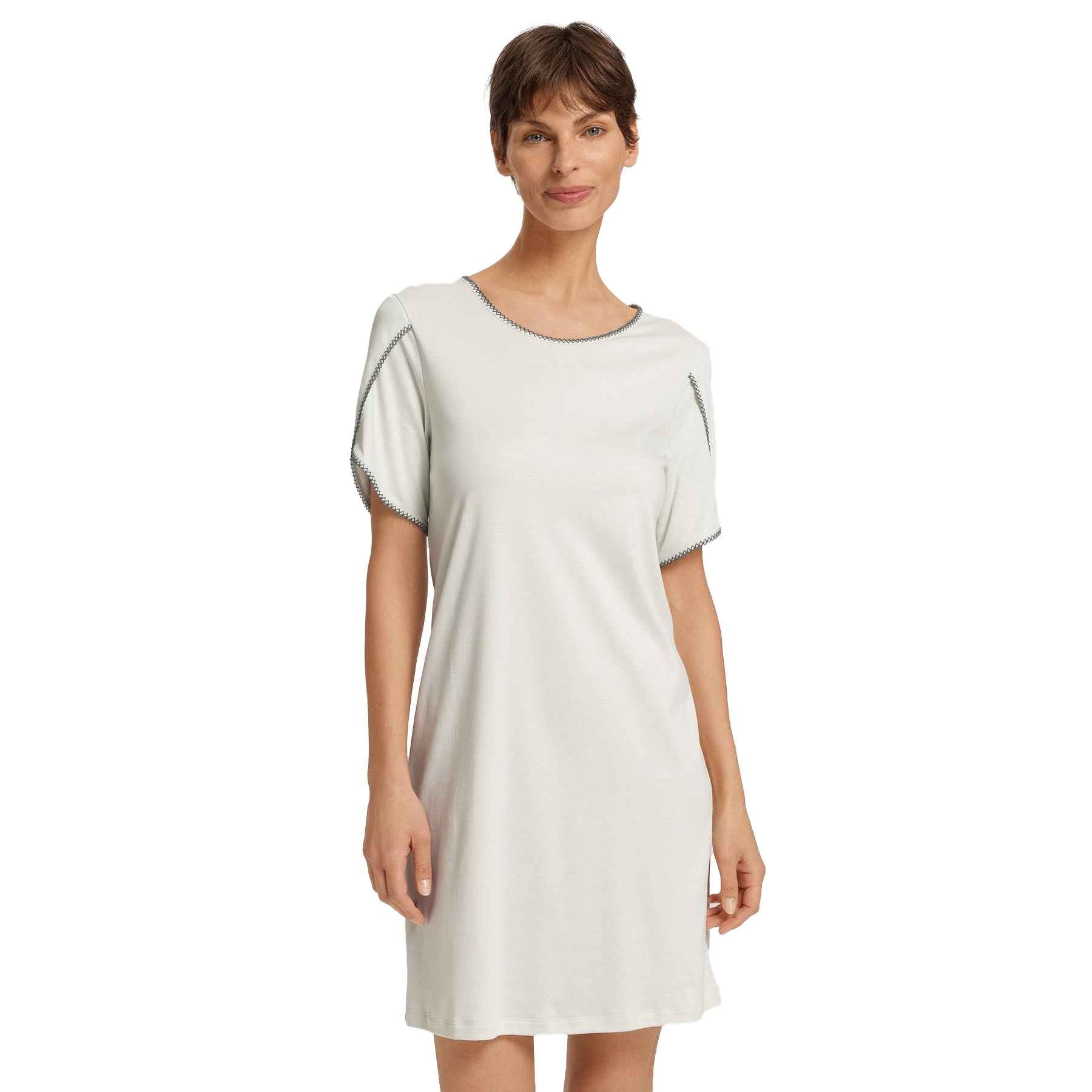 Light mint short-sleeve nightdress on model, featuring contrast edging and elegant simplicity.