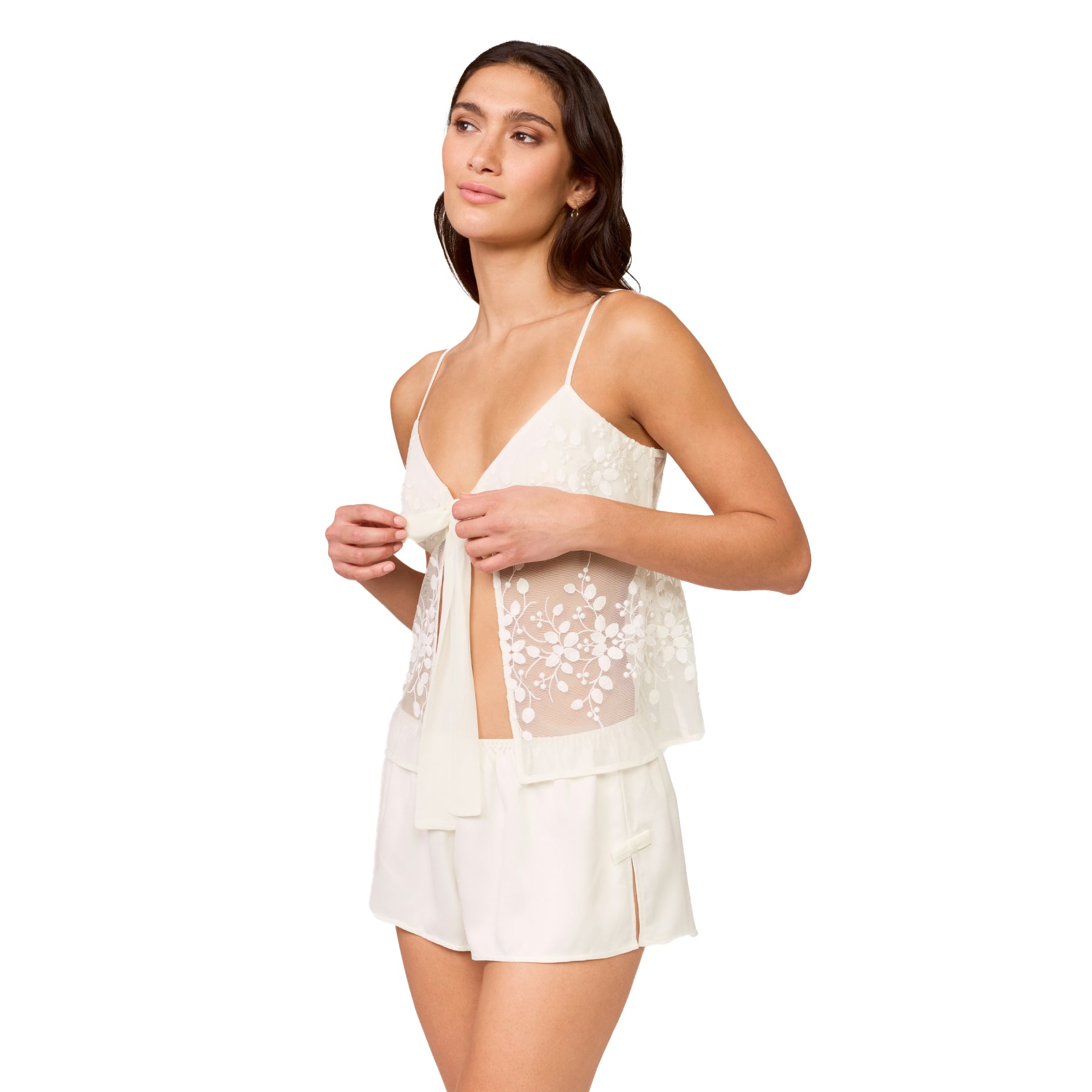 Ivory sheer lace camisole with floral embroidery, front tie detail, and coordinating lightweight sleep shorts.