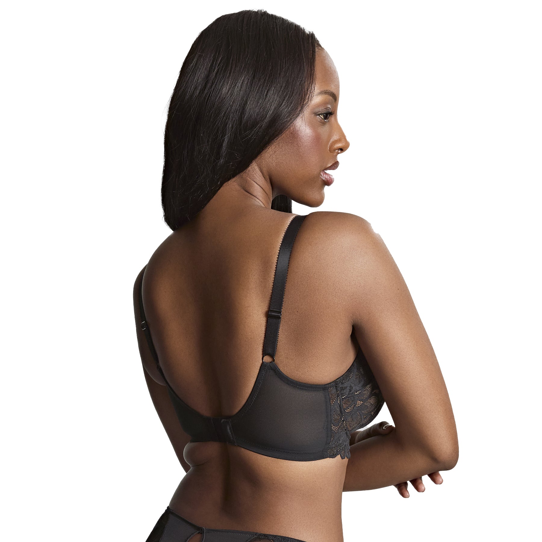 Back view of black lace balconette bra showing smooth band, adjustable straps, and hook closure.