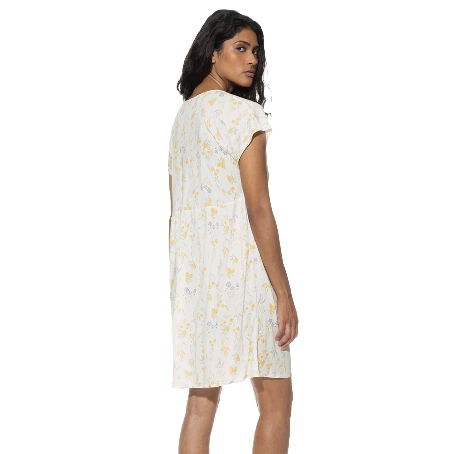 Back view of the woman in the nightdress, showing the relaxed, flowy fit and all-over floral pattern.