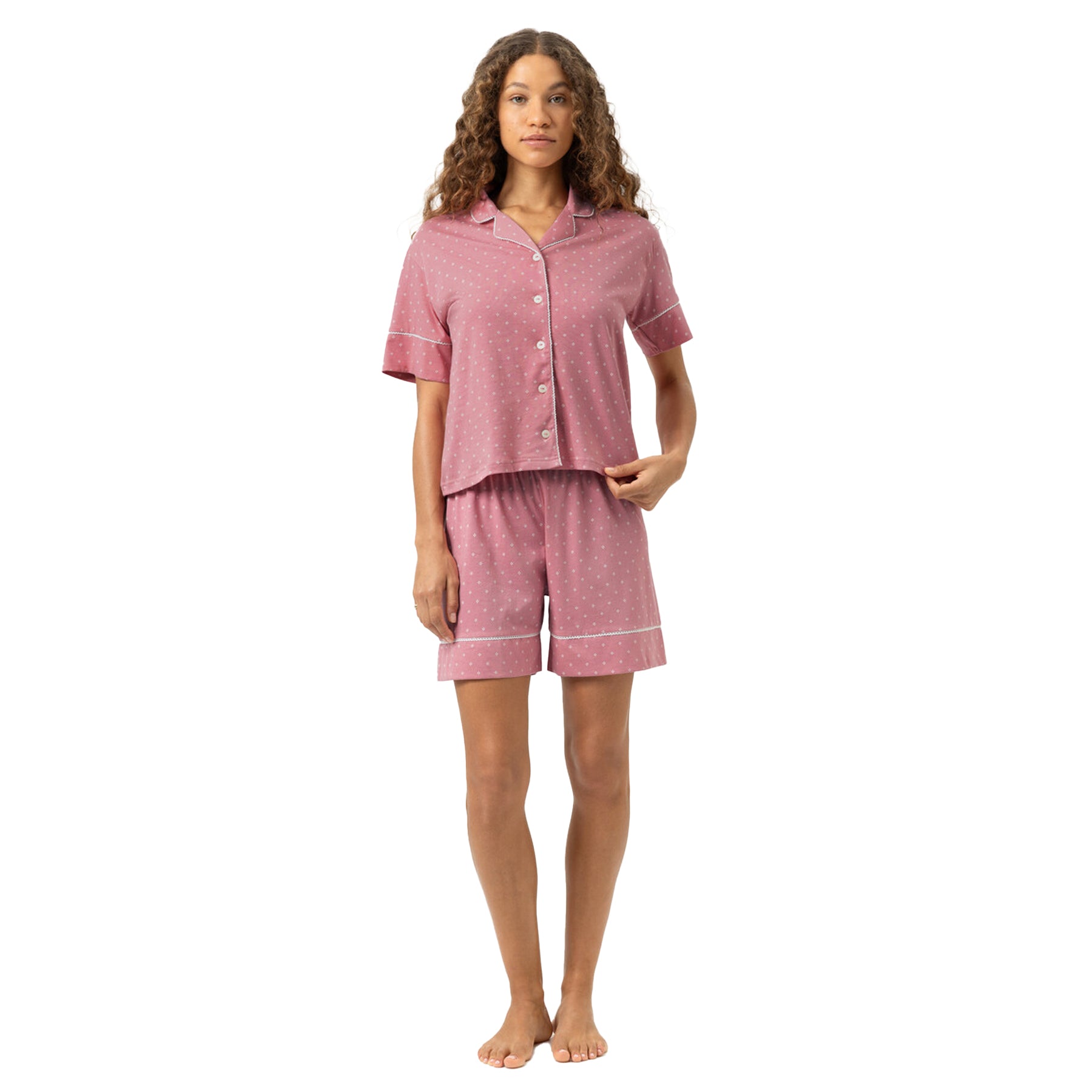 Women’s soft rosewood short sleeve nightdress with white micro print, styled with open button front.