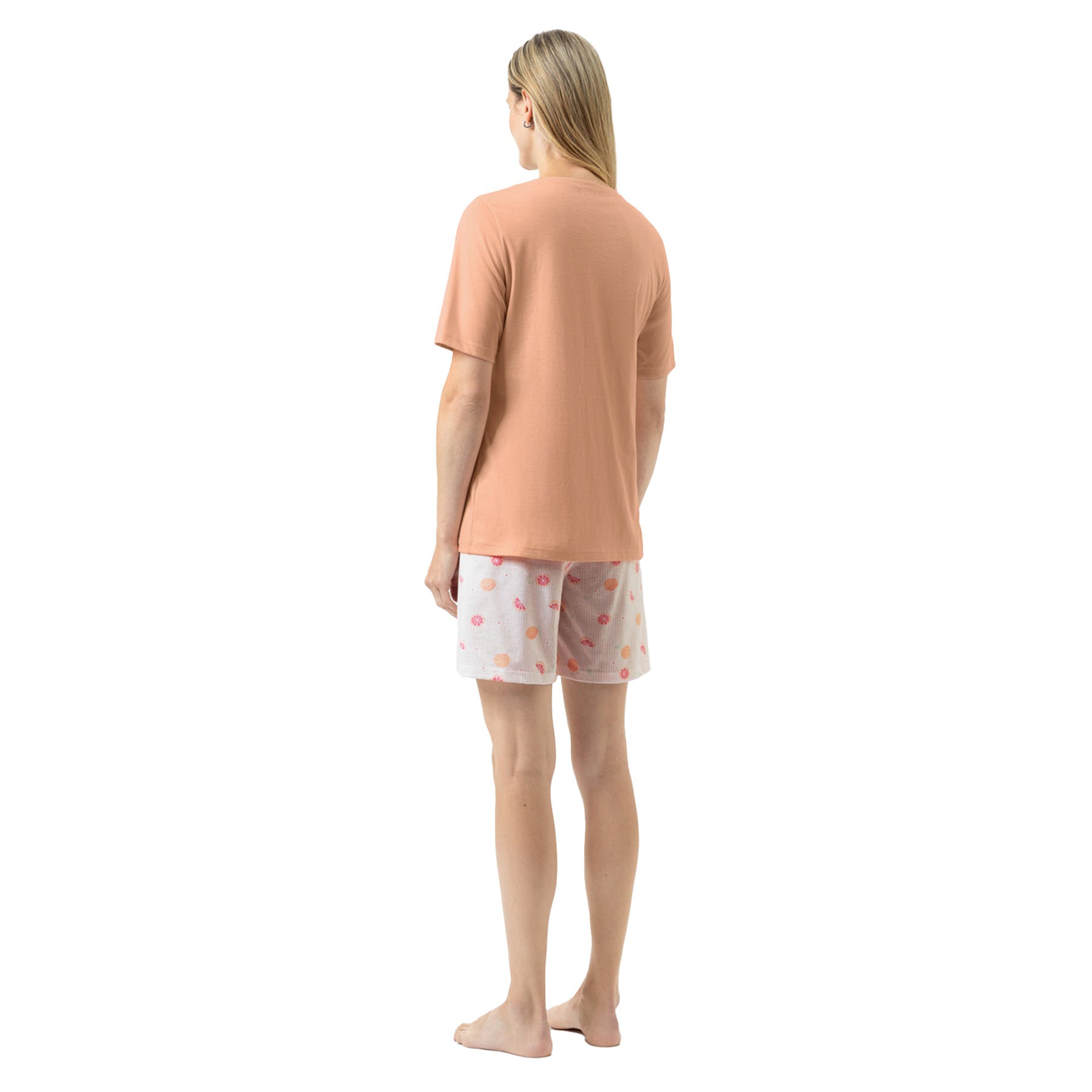 Back view of women's peach T-shirt pyjama set with citrus fruit print shorts