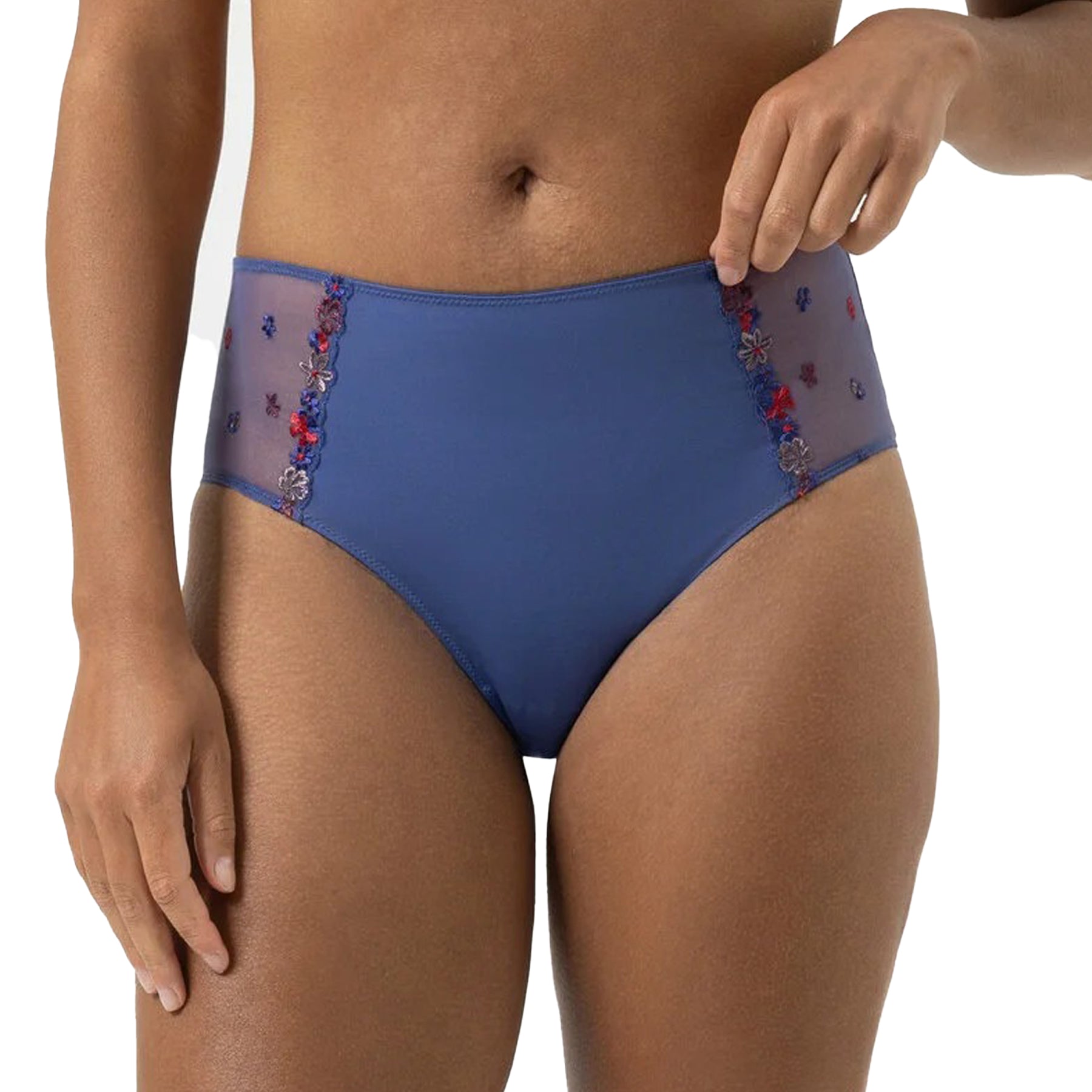 High-waist blue briefs with sheer embroidered floral side panels, front view on model