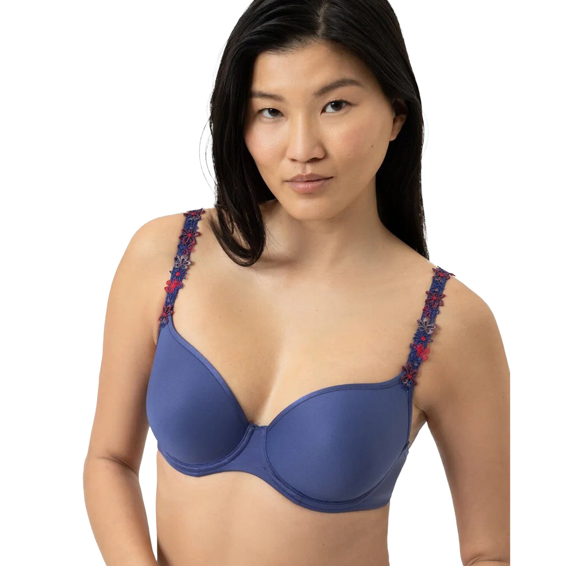 Blue spacer plunge bra with smooth cups and colourful floral embroidery on straps, angled front view on model