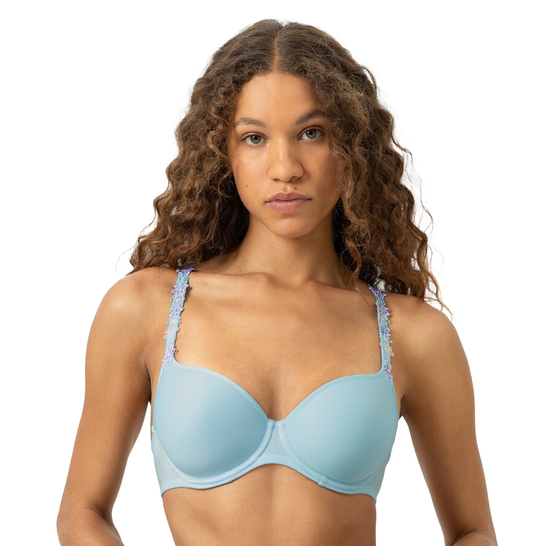 Light blue padded balcony bra with smooth cups and embroidered floral straps, front view on model.