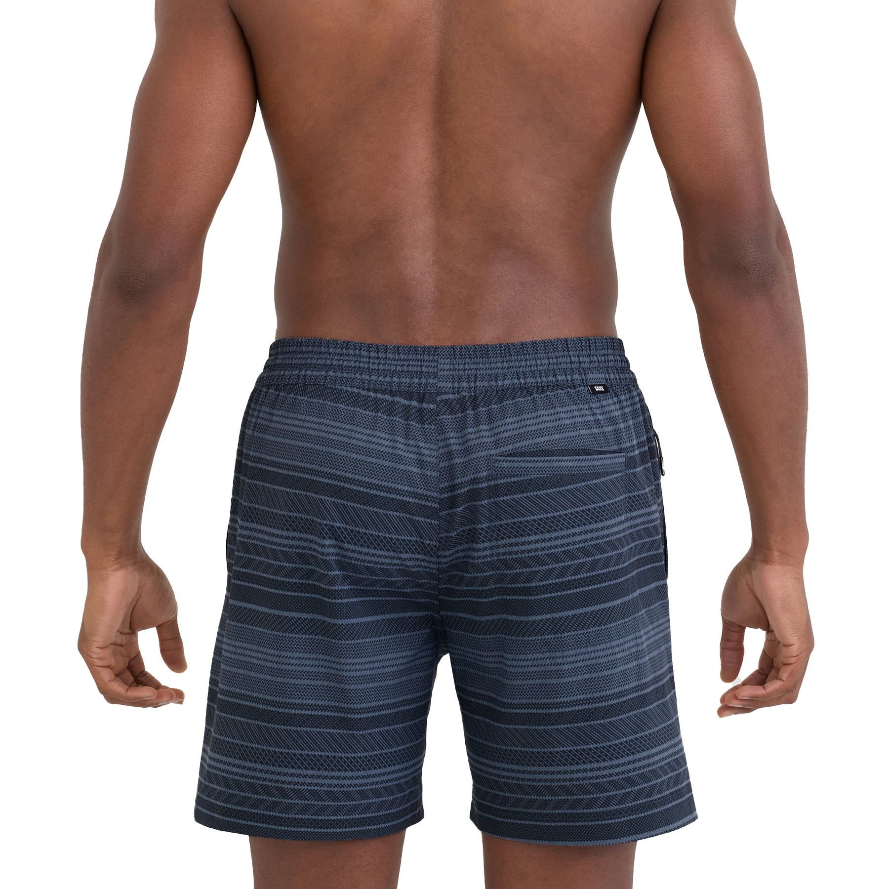 Back view of man wearing indigo striped swim shorts with elastic waistband and mid-length cut on a white background