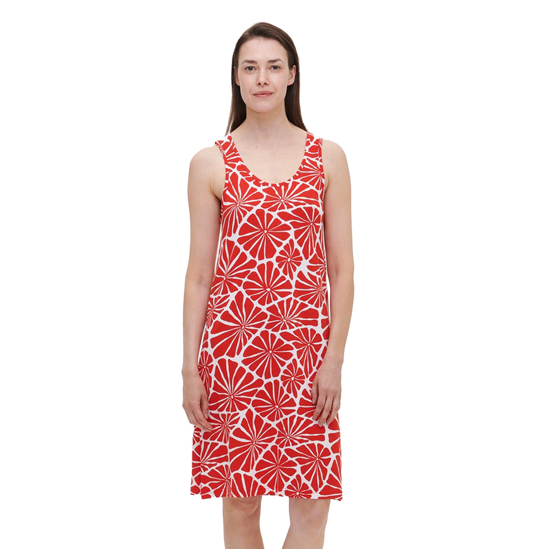 Woman wearing a sleeveless red and white floral print tank nightdress, standing with hands by her sides, on a white background.