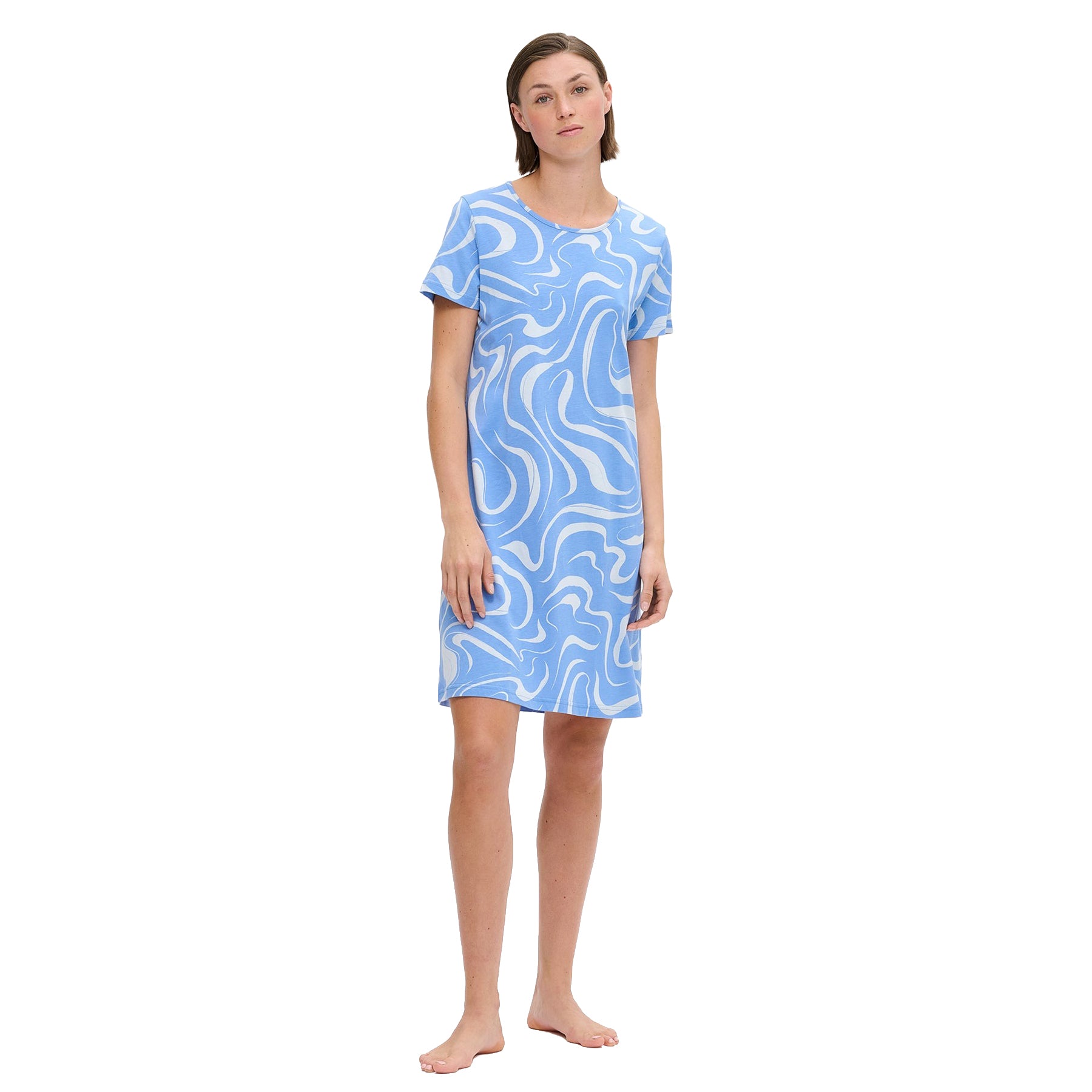 Light blue short-sleeve nightdress with white abstract swirl pattern, knee-length fit, shown on model standing barefoot against a white background.