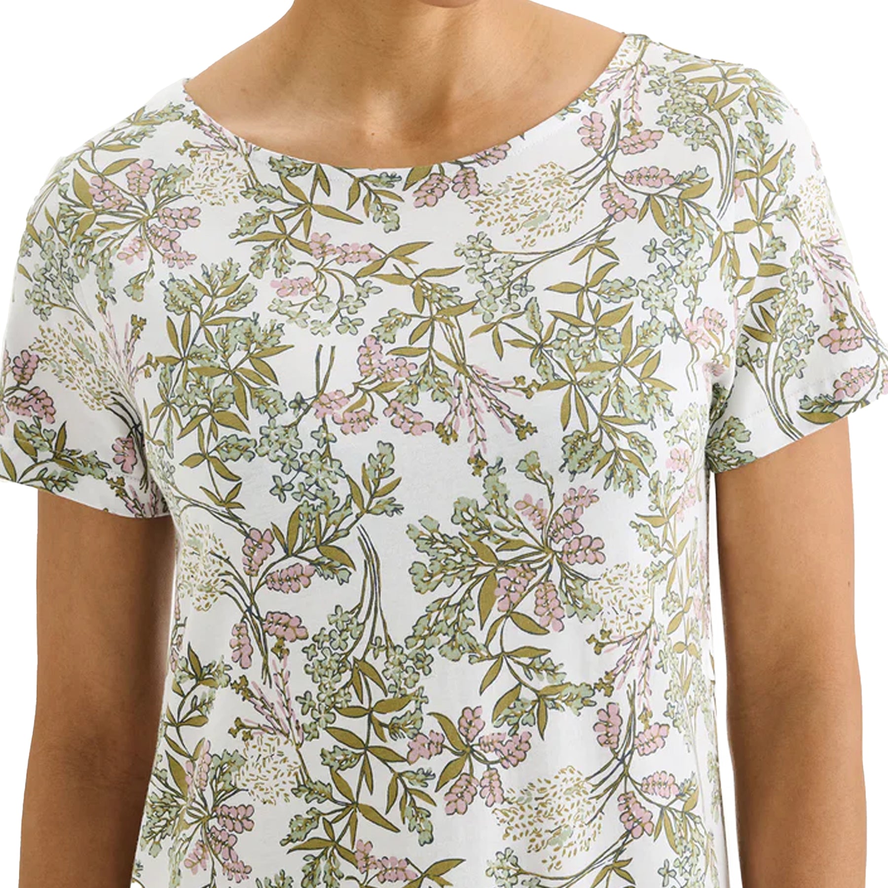 Close-up of ivory floral sleep dress with delicate green and pink botanical print, soft fabric nightgown