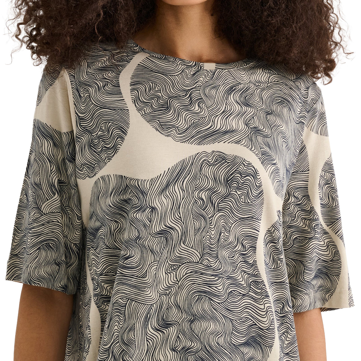 Close-up of Nanso Paasi Long Gown showing intricate grey wave print, round neckline and short sleeves