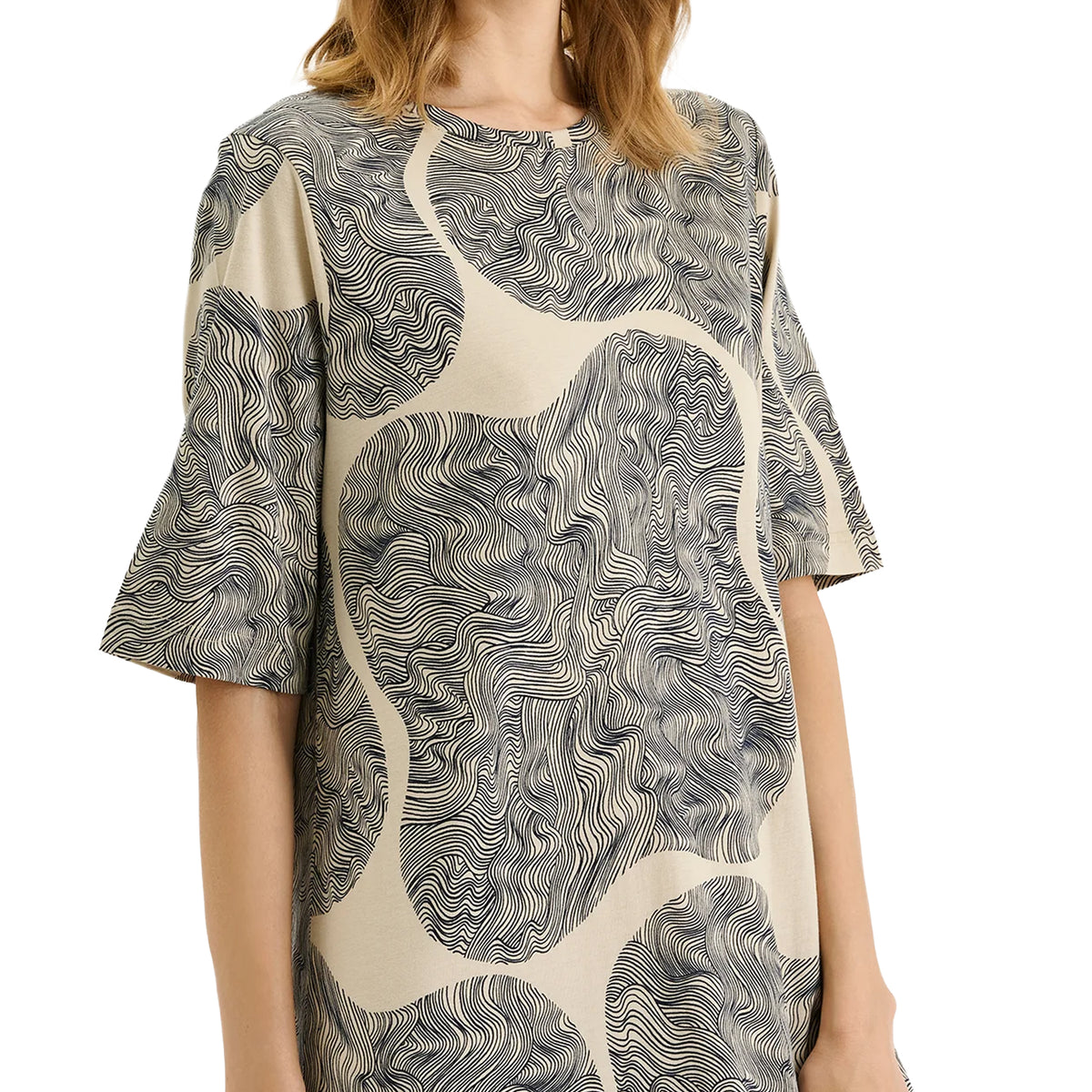 Close-up of Nanso Paasi Long Gown highlighting the flowing abstract wave pattern and relaxed fit