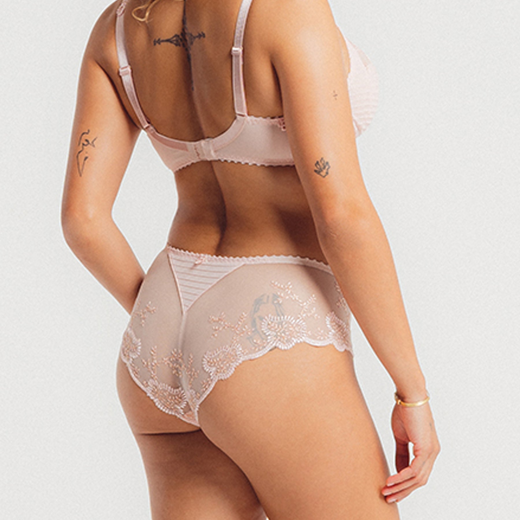 Back view of Louisa Bracq Elise Shorty in Nude Rose - sheer tulle with rose-tone embroidery and scalloped edges