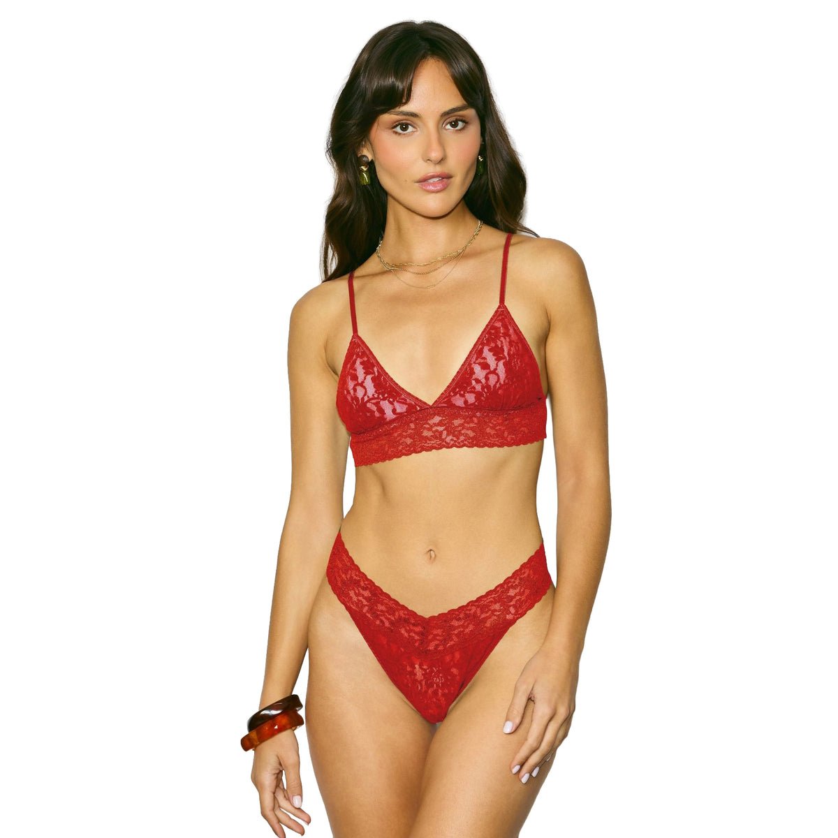 Model wearing the Hanky Panky Regular Rise Thong in Clay Ole red lace with a matching lace bralette.