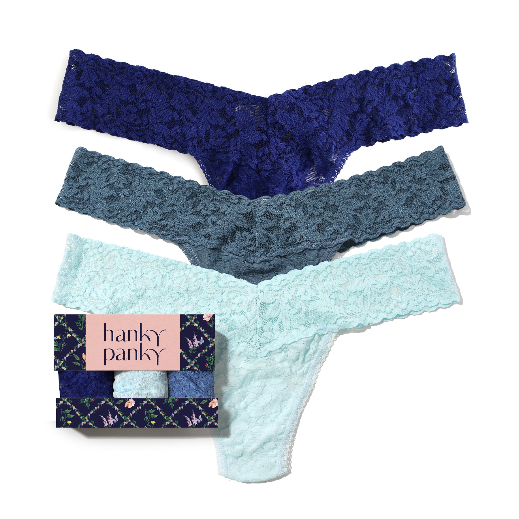 Three pairs of lace thongs in blue, gray, and light blue with a 'hanky panky' packaging box.