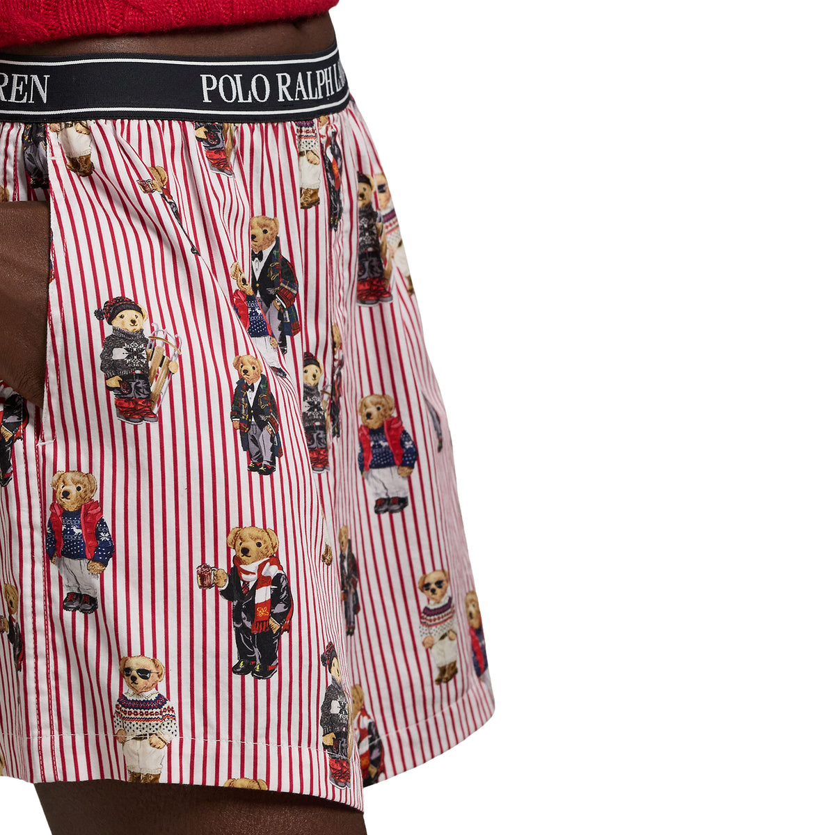 Close-up of Polo Ralph Lauren women's boxer shorts featuring red and white vertical stripes, colourful Polo Bear prints, and a black logo waistband.