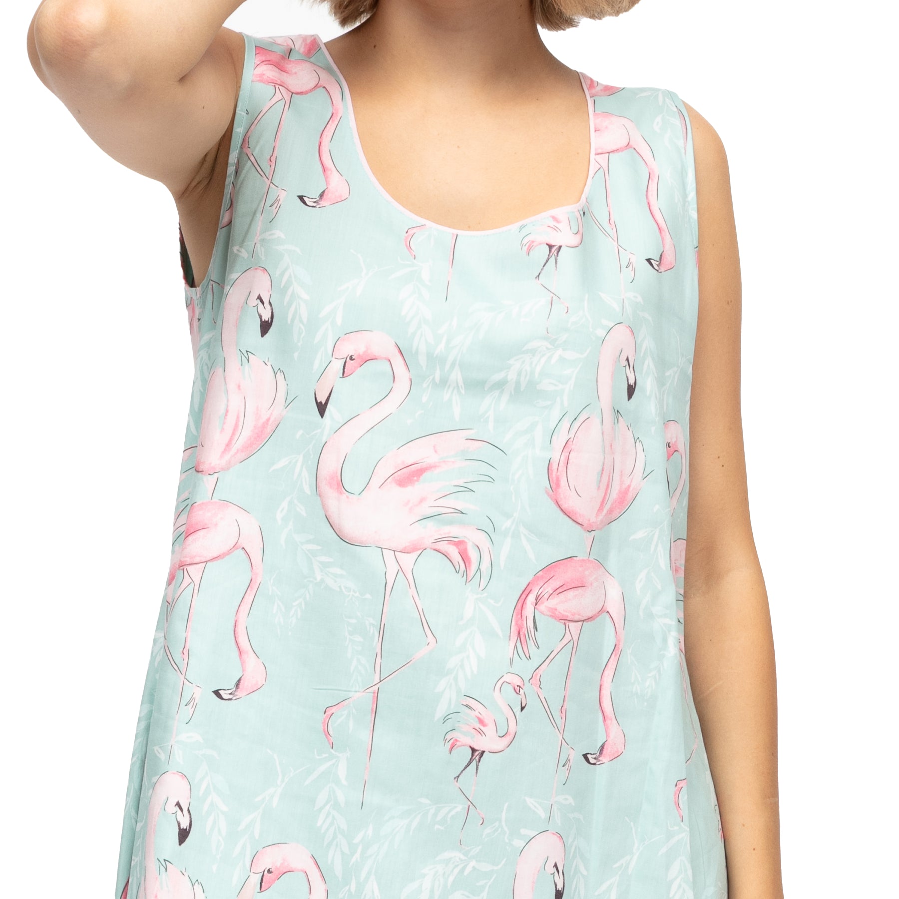 Close-up of mint flamingo print nightdress showing soft fabric and scoop neckline detail